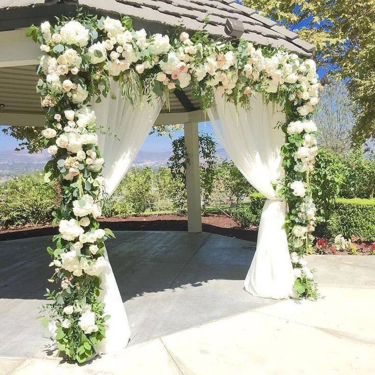 Garland for Wedding Ceremony  - Make your "I do" moment unforgettable with our beautifully designed wedding arch. Adorned with lush florals and soft greenery, this elegant structure creates a stunning focal point for your ceremony. Whether set against a beach, garden, or indoor backdrop, it adds a timeless touch of romance and charm to your special day.
