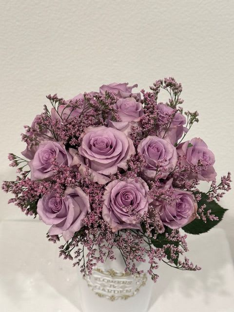 Enchantment  - One Dozen lavender roses in glass vase 