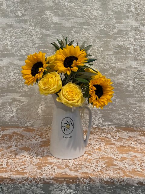 Rose Lemonade  - Yellow Rose and Sunflower arrangement in a pitcher.   