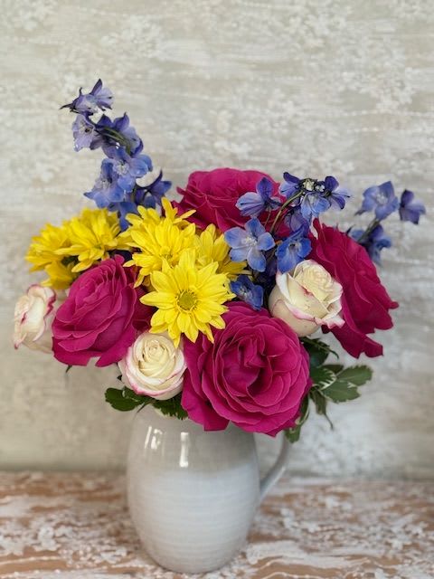 Rose kitchen pitcher - Pitcher of flowers to give your kitchen a pop of color.  If a particular flower, is unavailable, an item of similar quality and value will be substituted.
