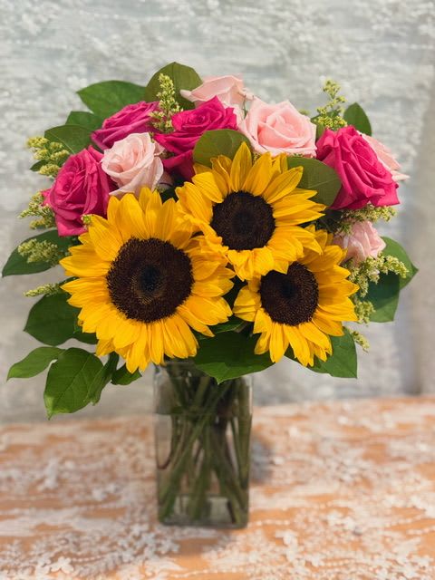 My Beloved - A bouquet filled with sunflowers and roses.   Roses can be changed to white or red.   If a particular flower, is unavailable, an item of similar quality and value will be substituted.