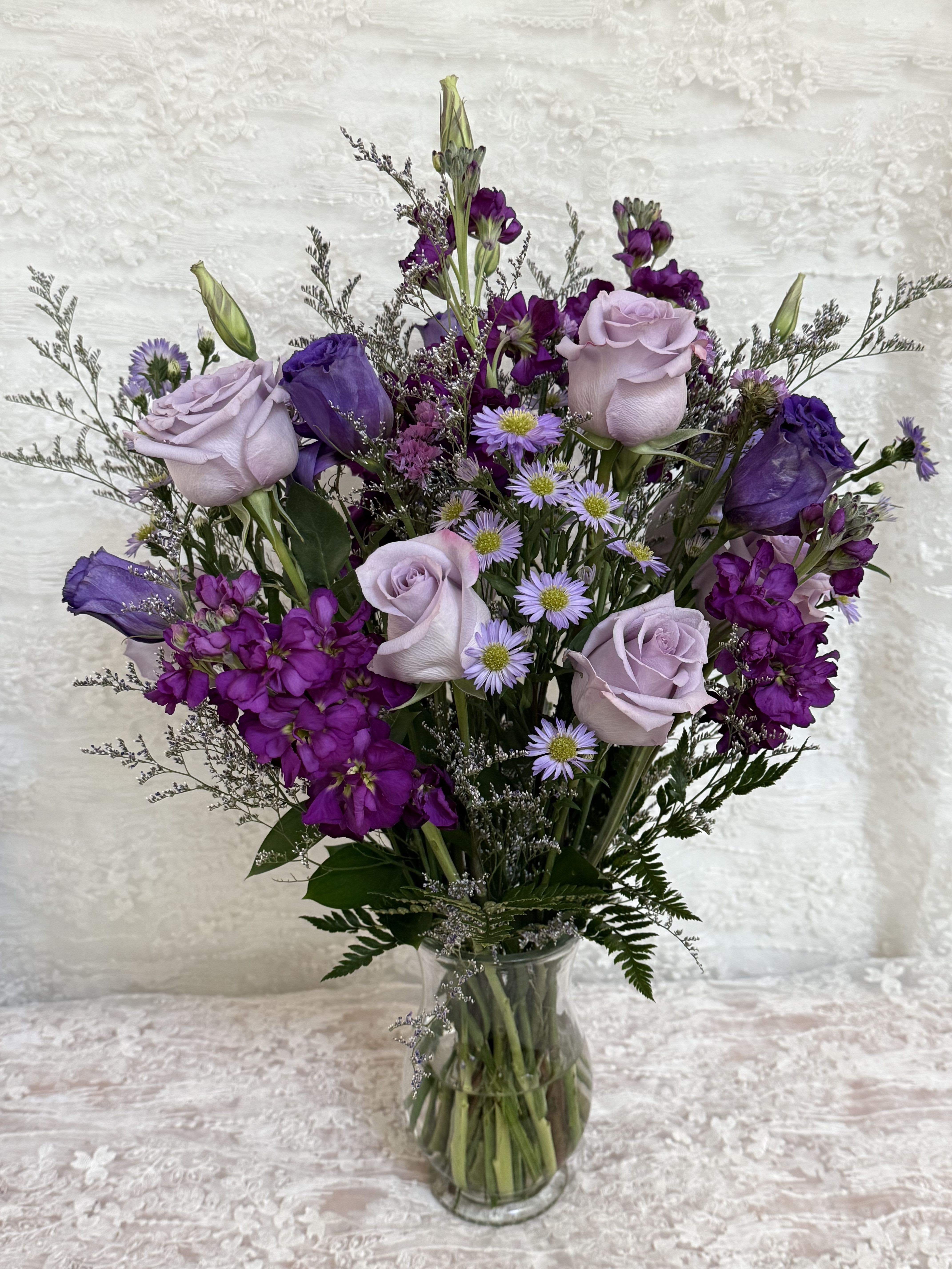 Positively Purple - Purple bloom arrangement  Perfect for a birthday, anniversary or get well. 