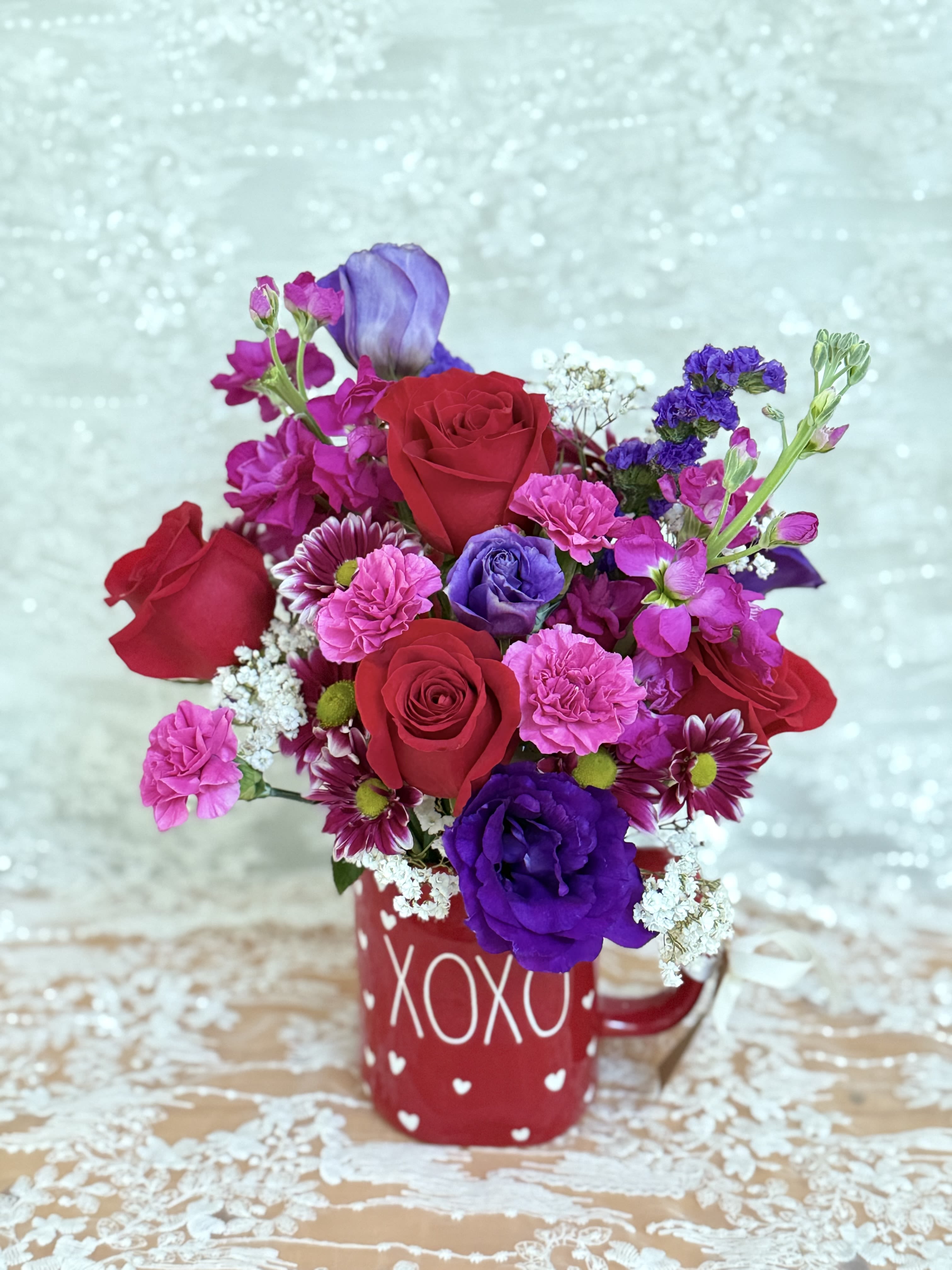 Coffee Love - Coffee mug filled with roses, lisianthus, and spray mums.