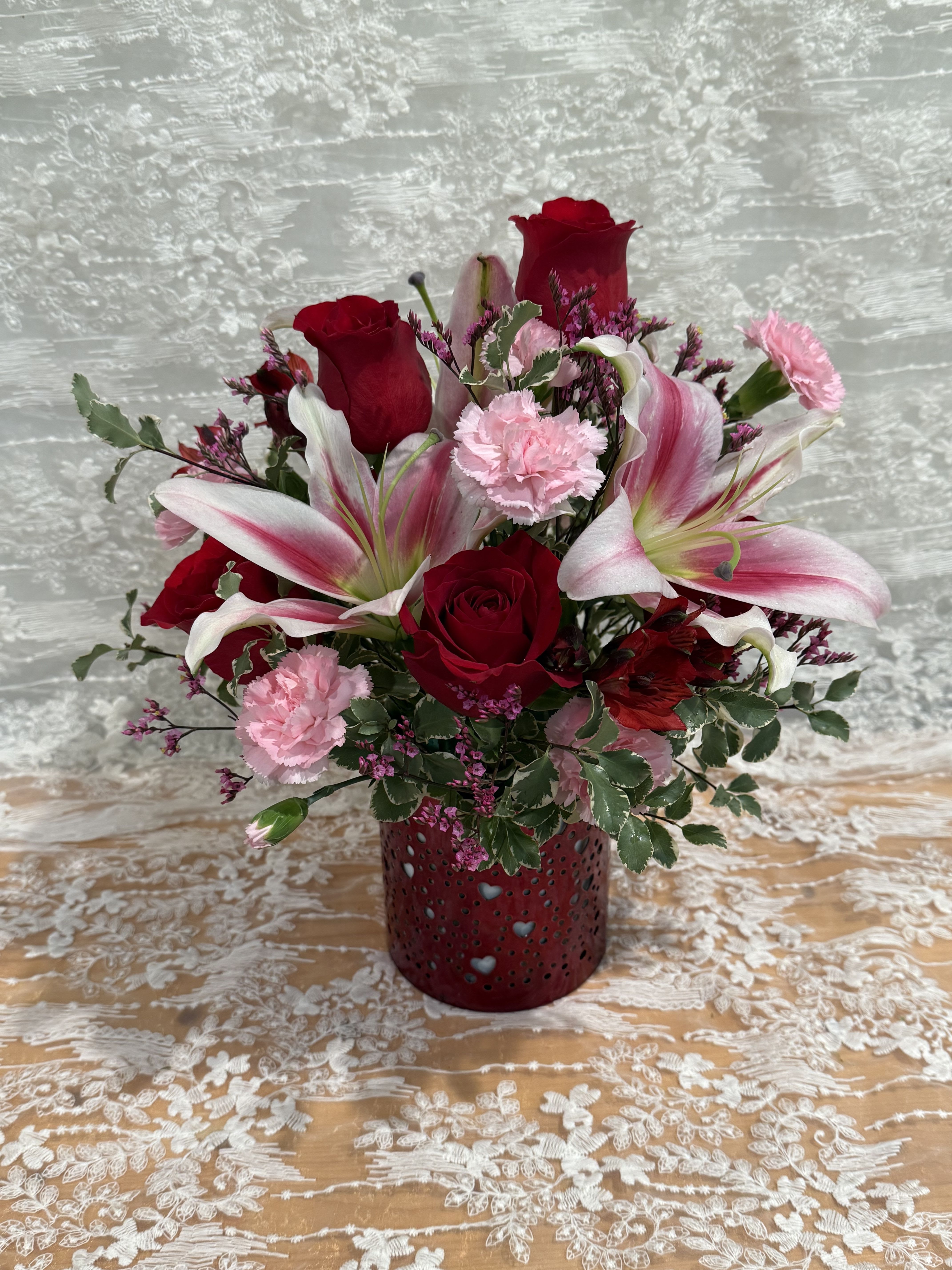 Heart Lantern - Arrangement in a red “lantern” container turns into a candle holder/lantern
