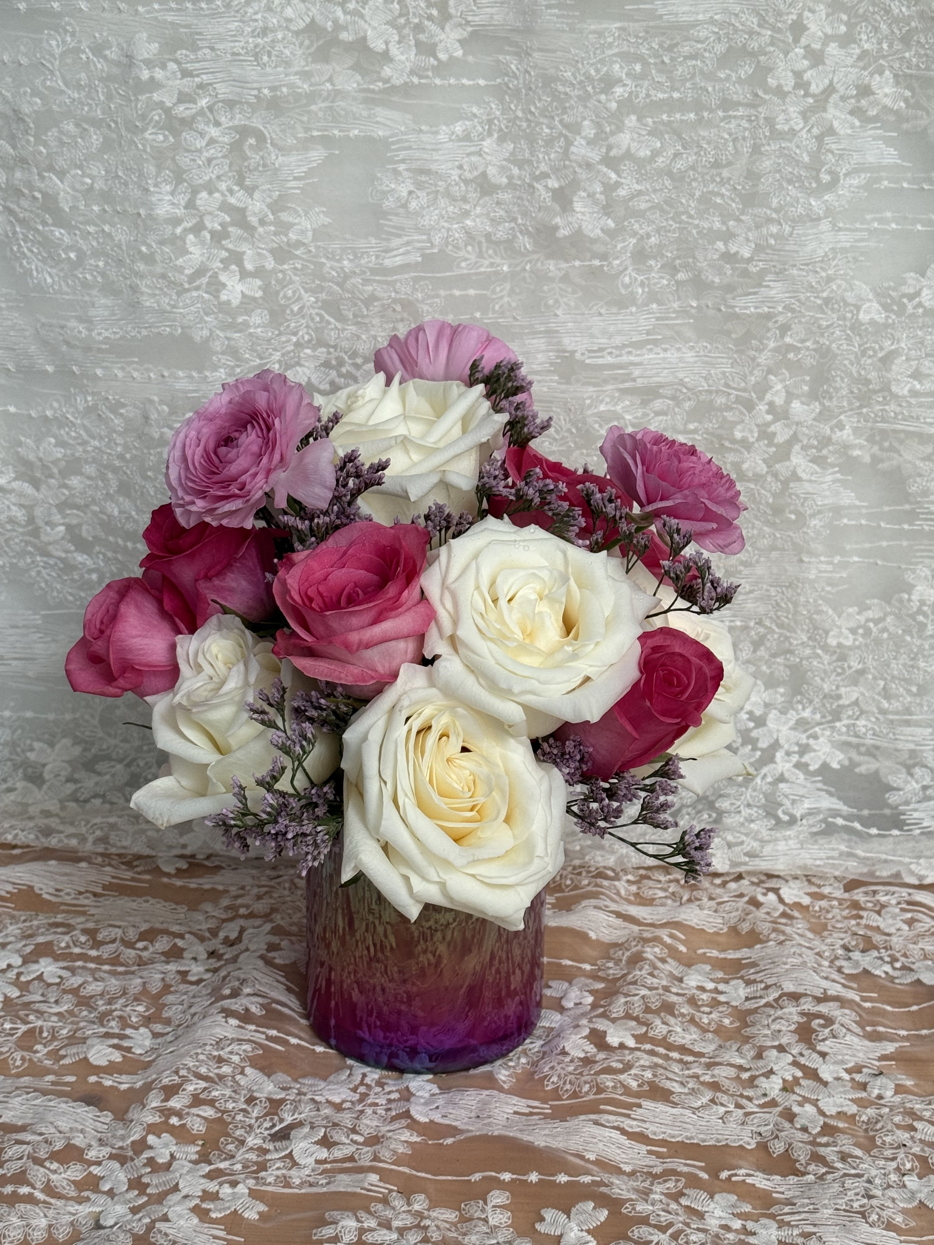 Warm Hug - Small arrangement with cream roses, pink roses and ranunculus 
