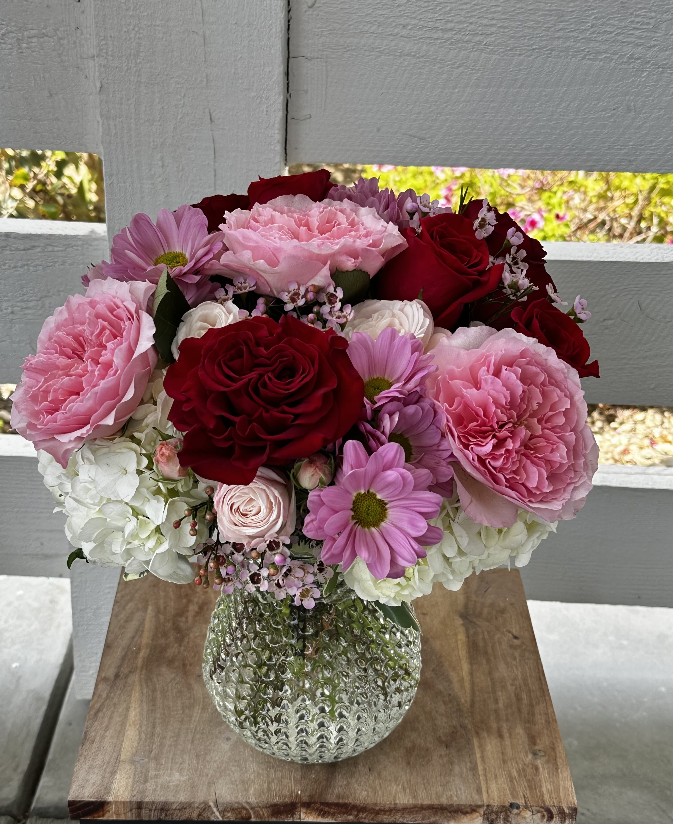 Burst of Roses - Mixture of garden roses, spray roses and regular roses with hydrangeas and chrysanthemums 