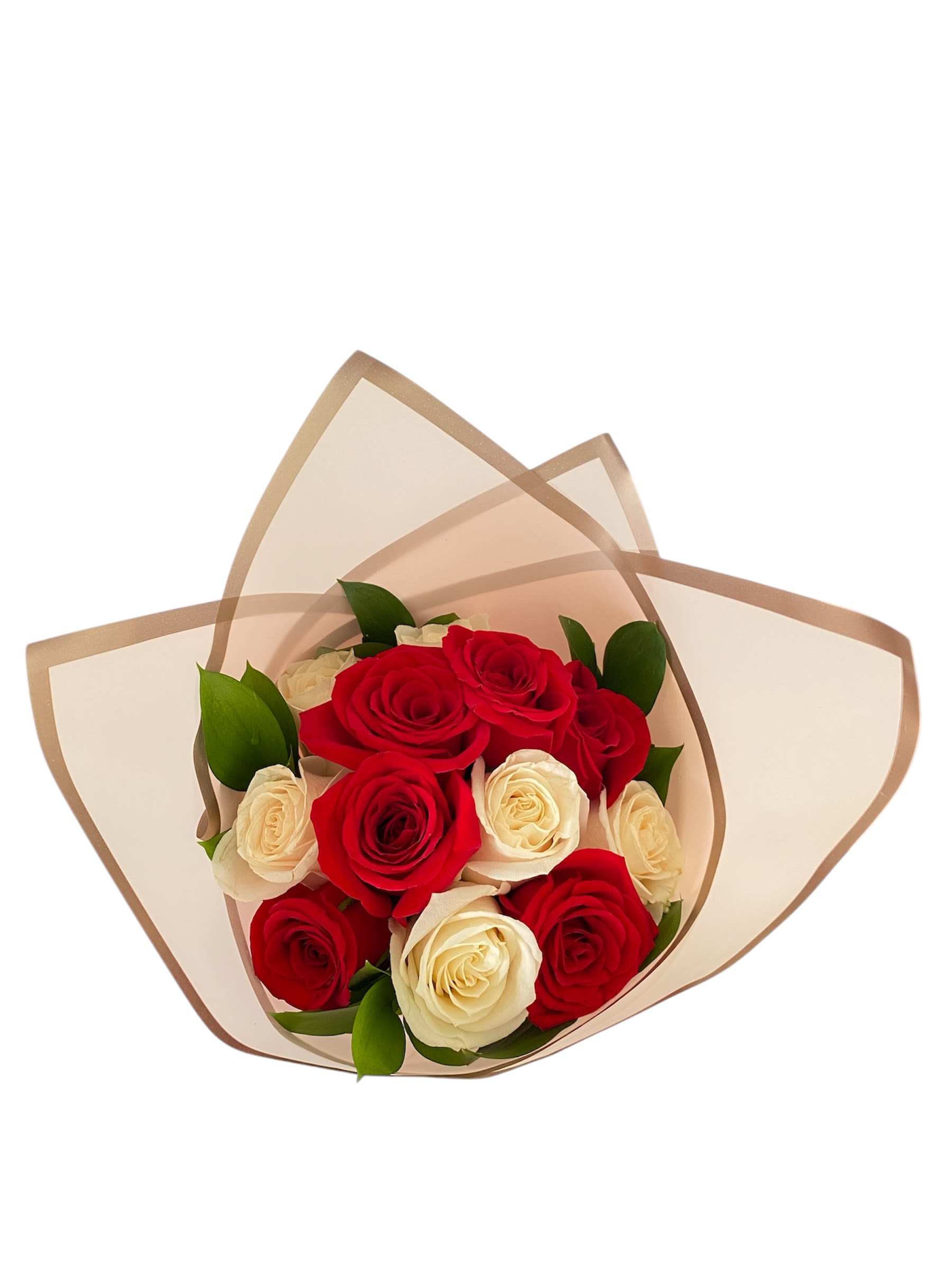 Bouquet of red and white roses wrapped in translucent paper