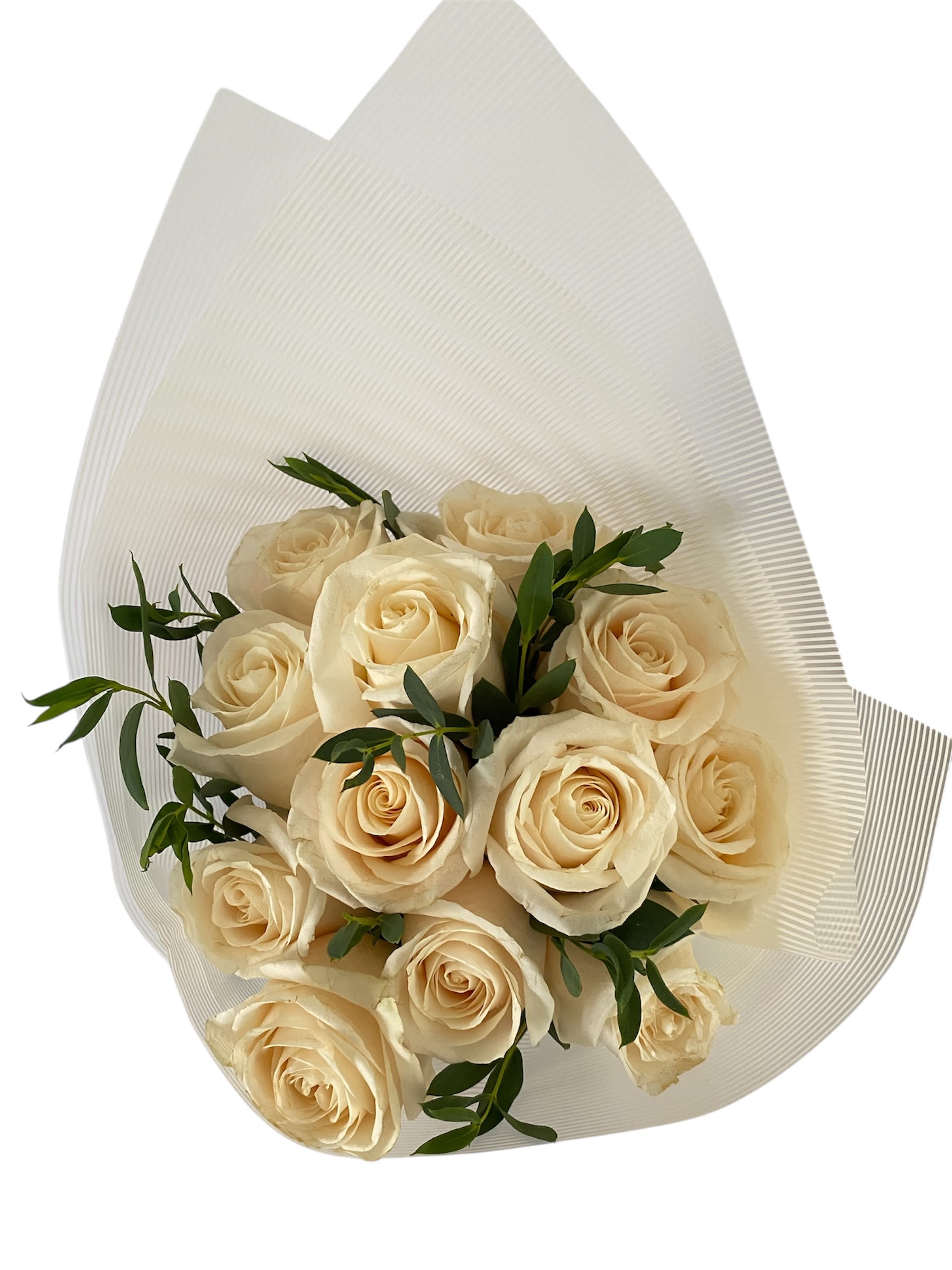Bouquet of cream roses wrapped in white paper