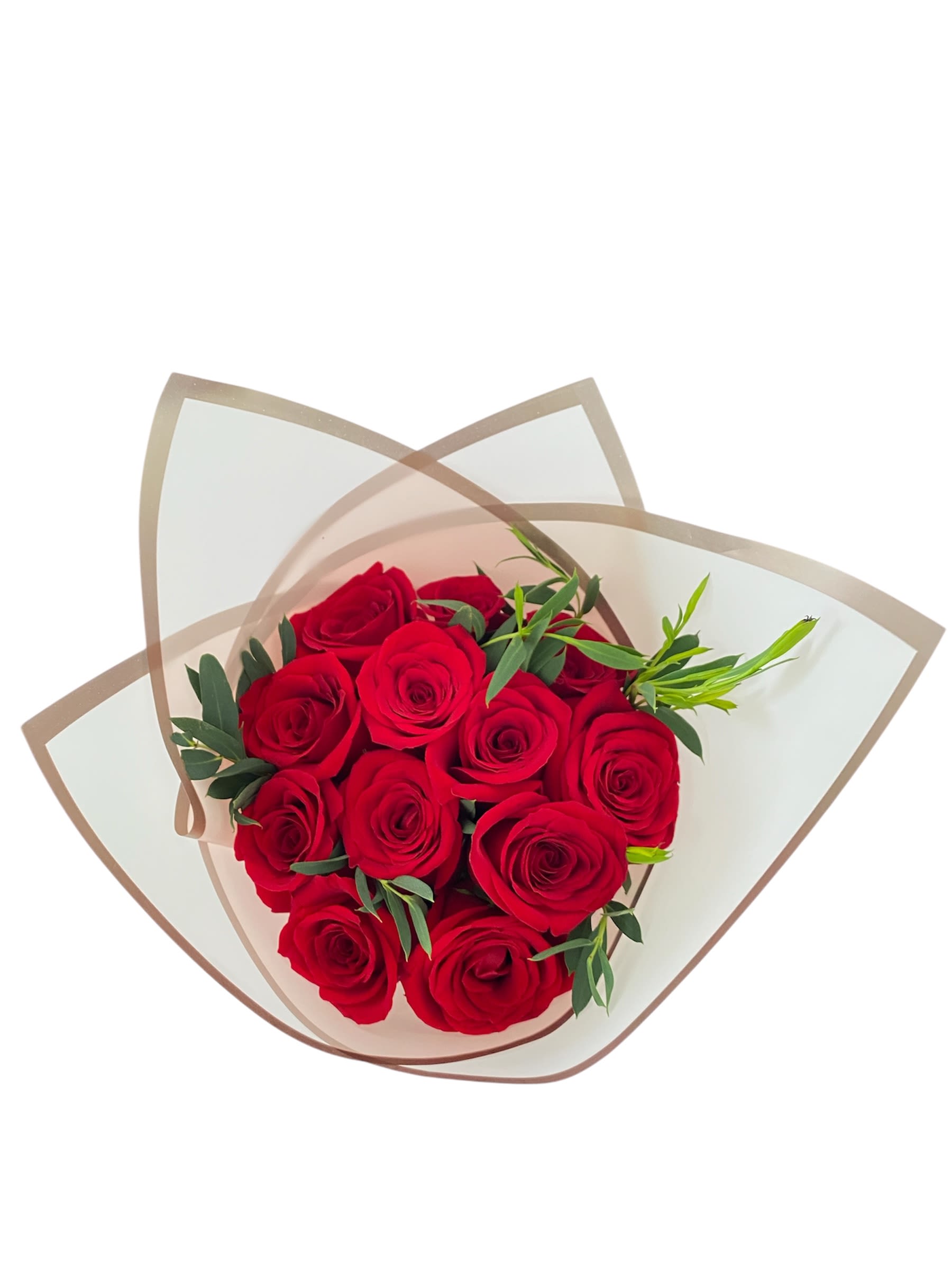 Bouquet of red roses wrapped in translucent paper