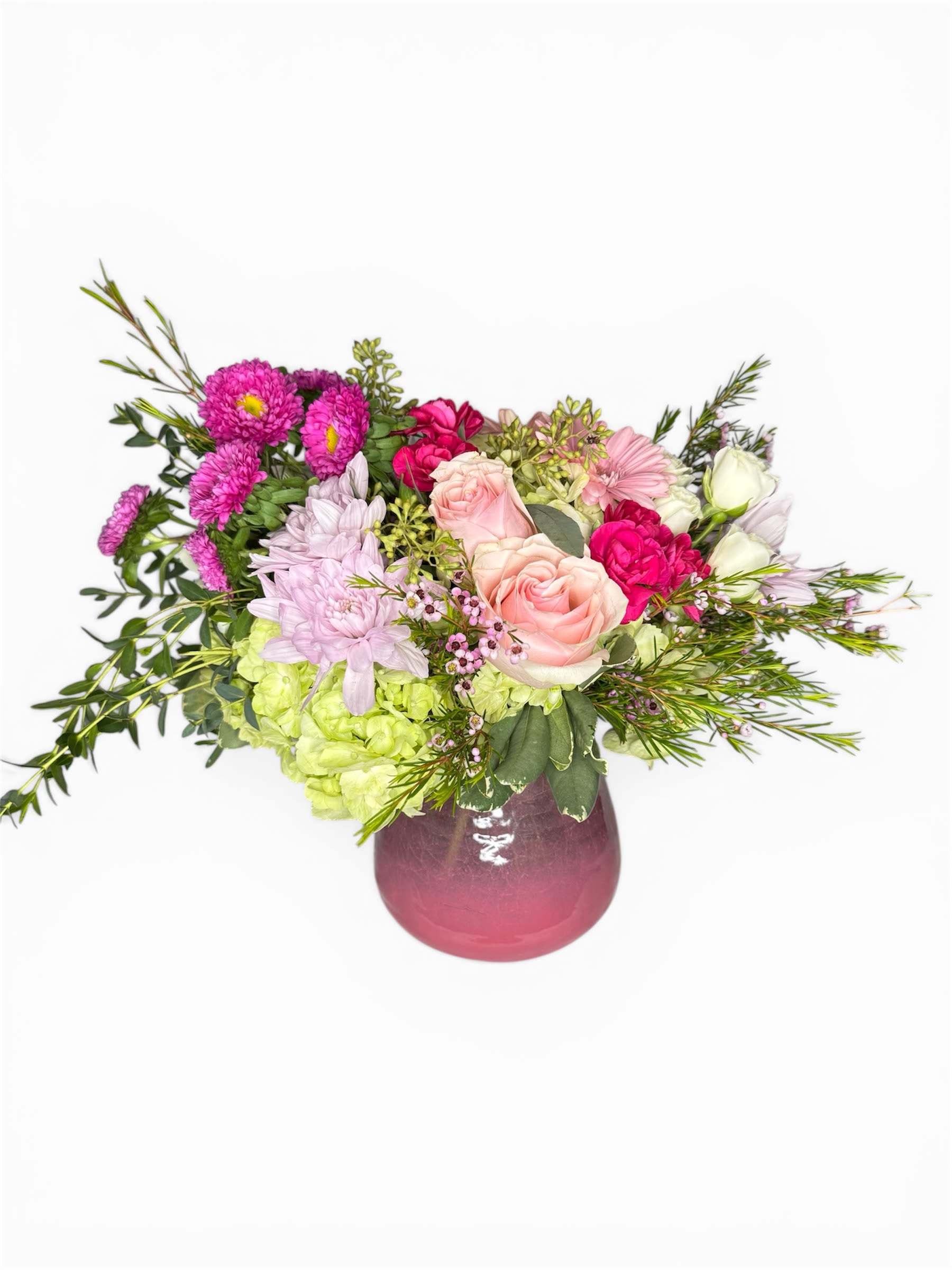 Sweetheart Garden - A blend of blush, pink, and soft lavender tones, gathered with lush greenery. This arrangement feels like a gentle embrace-warm, thoughtful, and full of heart.