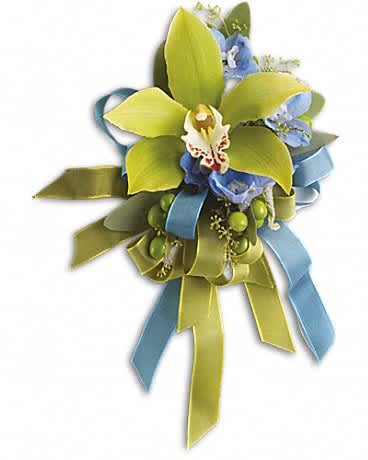 Boutonniere with green orchid petals, blue flowers, and ribbon streamers
