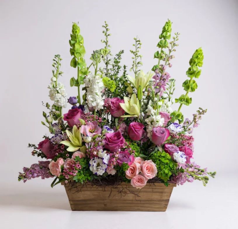 Soft garden mood  - Hand selected flowers in rich purple,soft pink,and lush green tones arranged with sophistication and artistic expression.