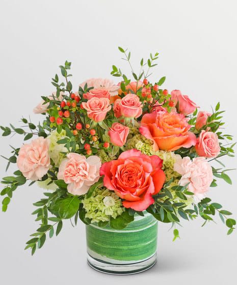 Golden sunset  - Bold and elegant, this orange rose arrangement captures the glow of sunset and the passion of heartfelt emotions.