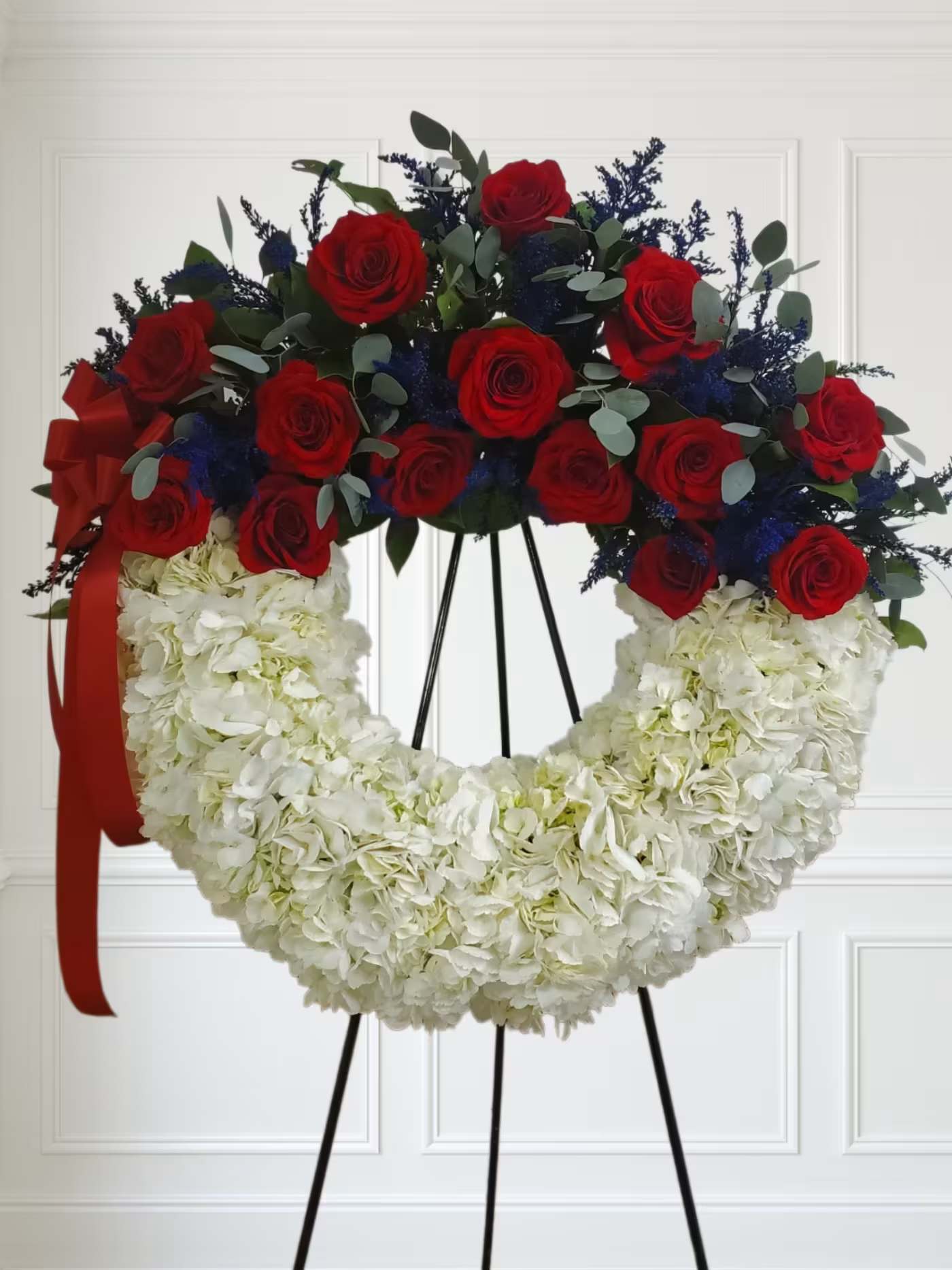 American Soul by Manny - A perfect way to honor their beliefs and actions, this red, white, and blue wreath is a tribute to those who loved their country. 