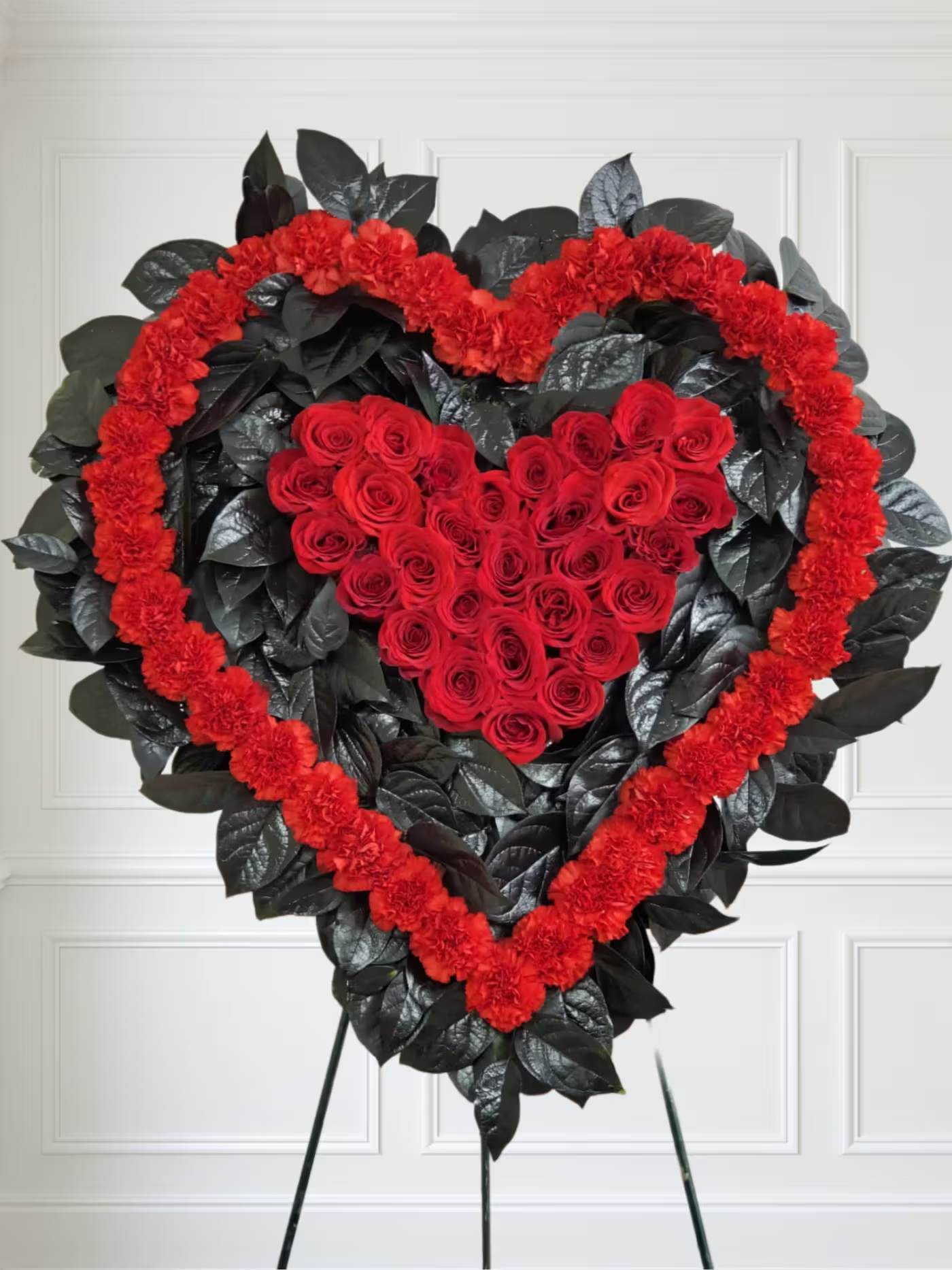 Pure Love Double Heart - Red and black double heart. 40 Red carnations, 30 Red roses, 1bu of lemon leaf tinted balck.