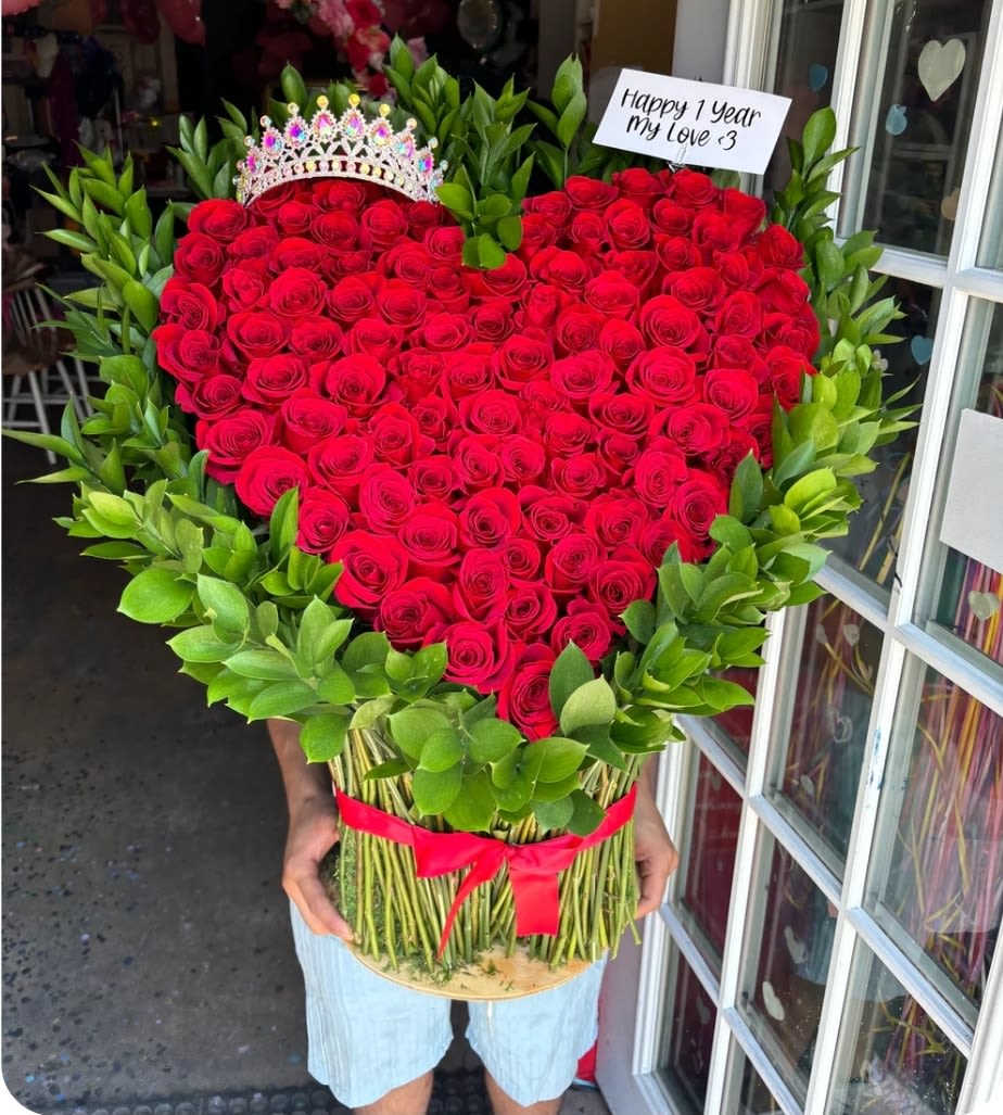 Standing Heart - A Grand Gesture of Love  Our Standing Heart is a stunning floral tribute, handcrafted in the shape of a heart and designed to stand tall with elegance and meaning. Whether for a romantic surprise, celebration of life, or heartfelt tribute, this arrangement speaks volumes without saying a word. Made with premium blooms in the colors of your choice.  A powerful symbol of love, remembrance, and devotion.   Delivery available  Elegant. Emotional. Unforgettable. 