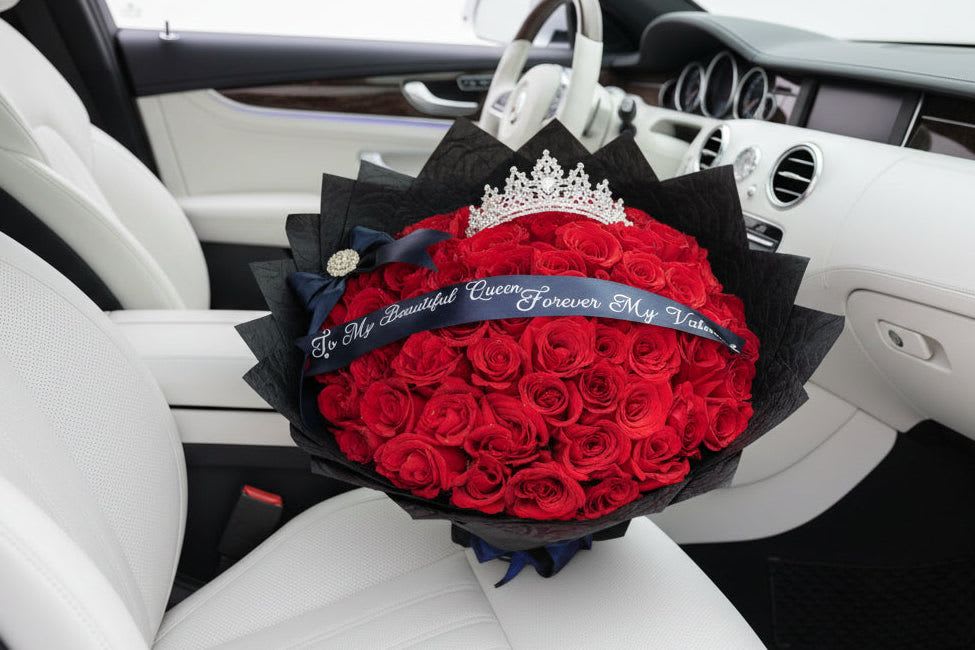 100 Intense Love  - Red roses wrapped in sleek black paper for a bold and unforgettable statement. Perfect for those who love with passion and elegance. Yansa Flowers — delivering beauty and luxury with every arrangement. 