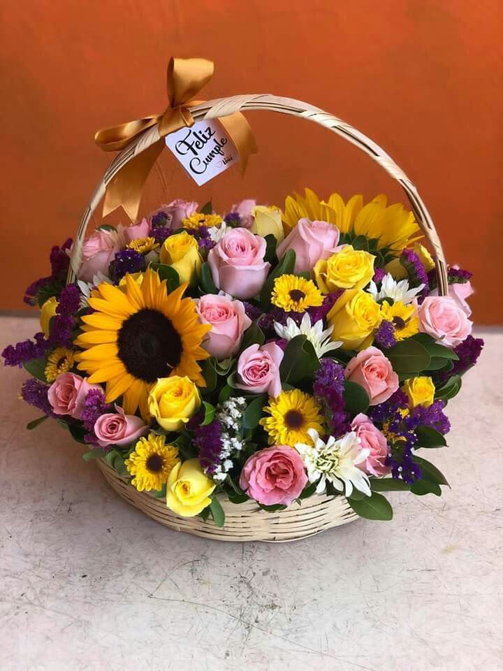 Springtime Joy Basket - Celebrate the beauty of the season with this vibrant floral basket, thoughtfully arranged with a mix of fresh, colorful blooms. Bursting with life and natural charm, it brings warmth, happiness, and a refreshing touch of spring into any space. 