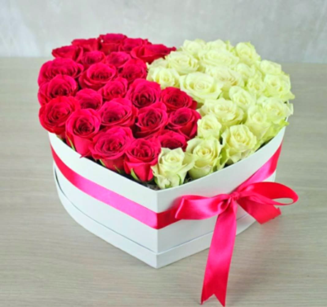 The Pink &amp; White Harmony Heart - A stunning balance of elegance and passion. This luxury white heart-shaped box features a breathtaking dual-tone arrangement of premium hot pink and crisp white roses. Handcrafted with artistic precision,