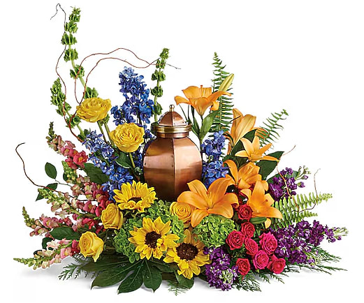 Mixed floral arrangement with a copper urn centerpiece