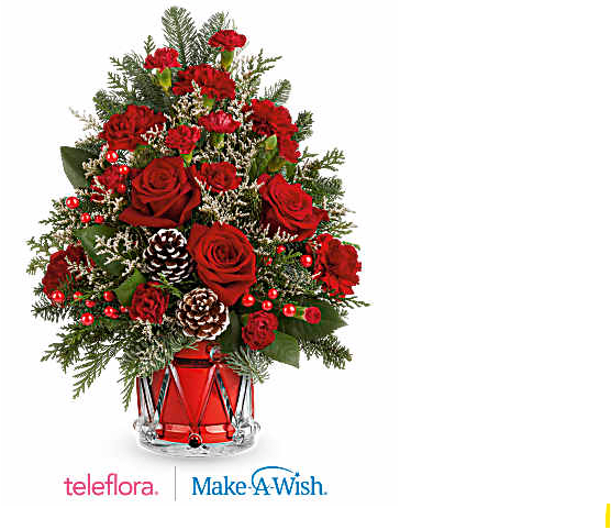 Red roses and carnations in a glass vase with pinecones
