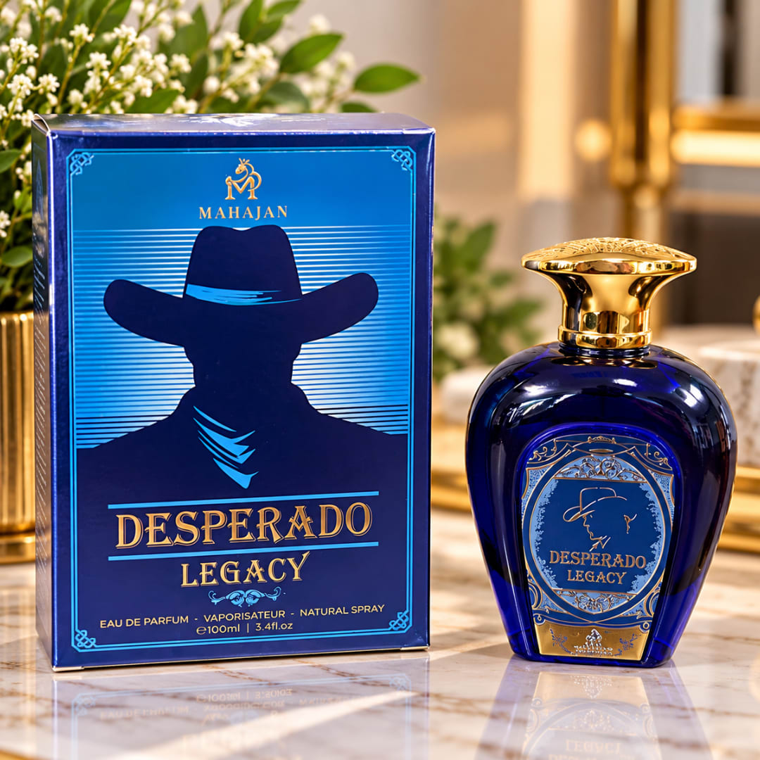 Blue perfume bottle and matching box on a table