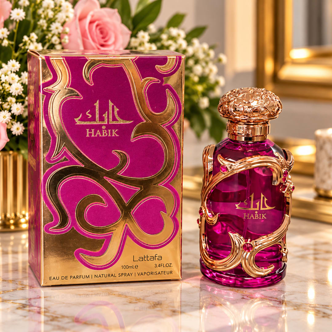Perfume bottle and matching box on a marble surface