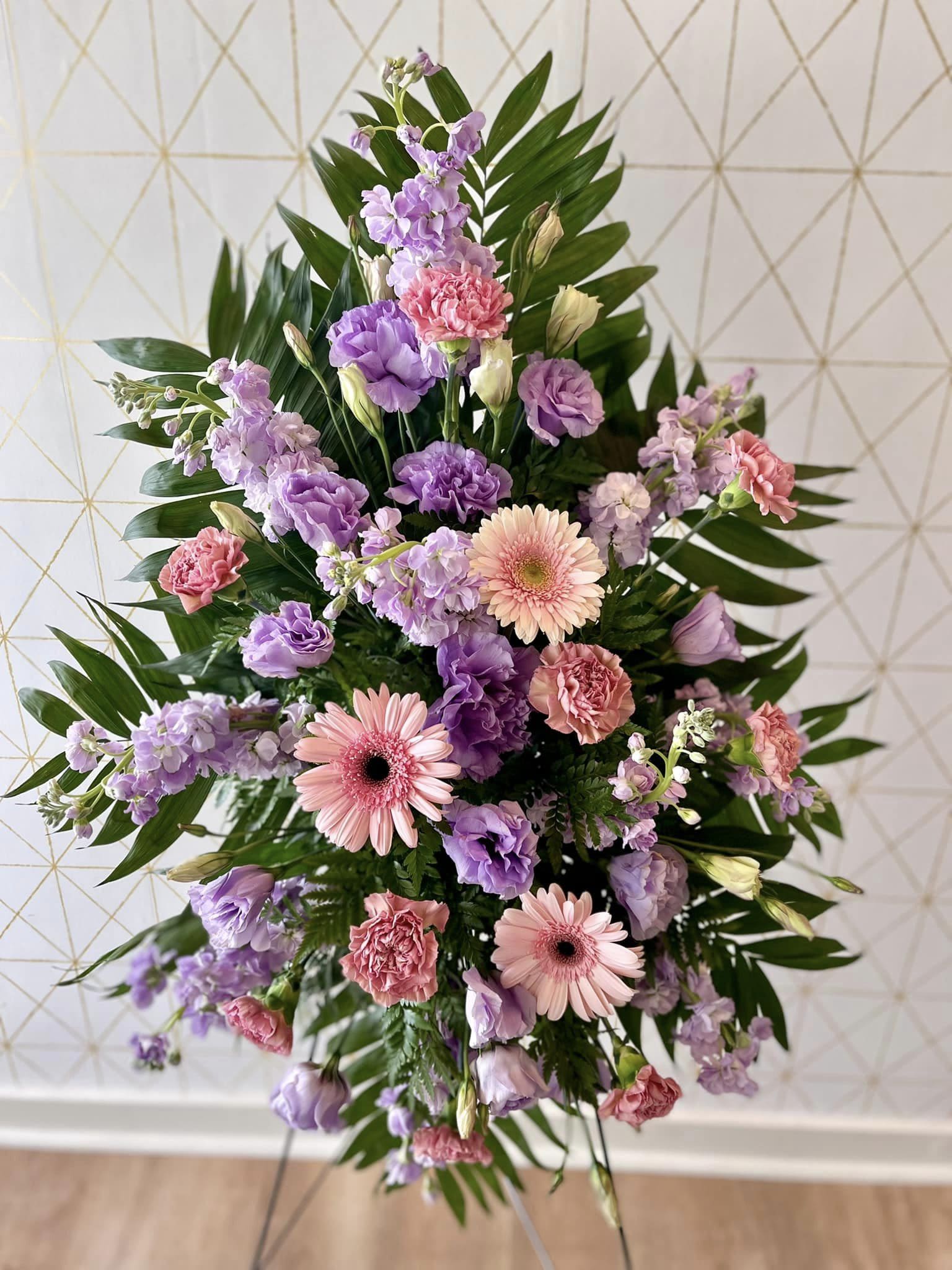 Call to order - Sympathy Easel - Spray - Our Easel Spray is fully customizable in colors and flowers. Easel Sprays begin at $150. Easel Sprays can get larger in size, include more flowers and include higher end flowers as the price increases.   Please call to discuss customizations.