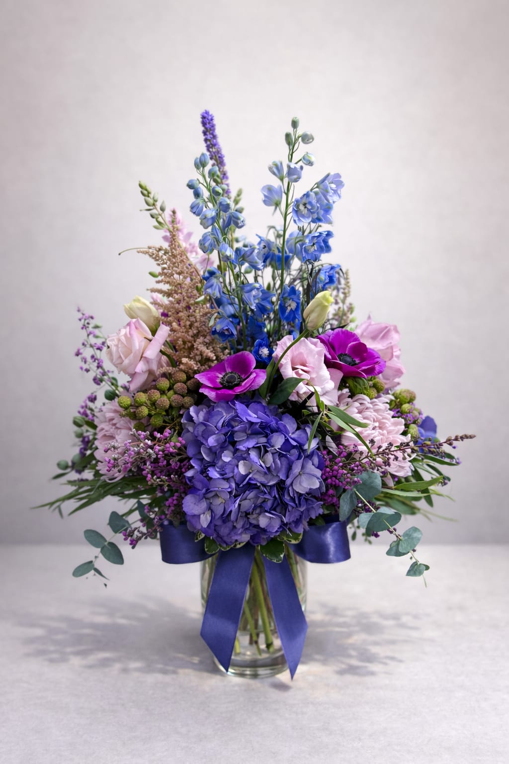 Amethyst Aria - For a friendly Pisces or dreamy garden lover, Amethyst Aria is a lush, indigo and blush composition that rises with a magical hue and delicate, layered movement.