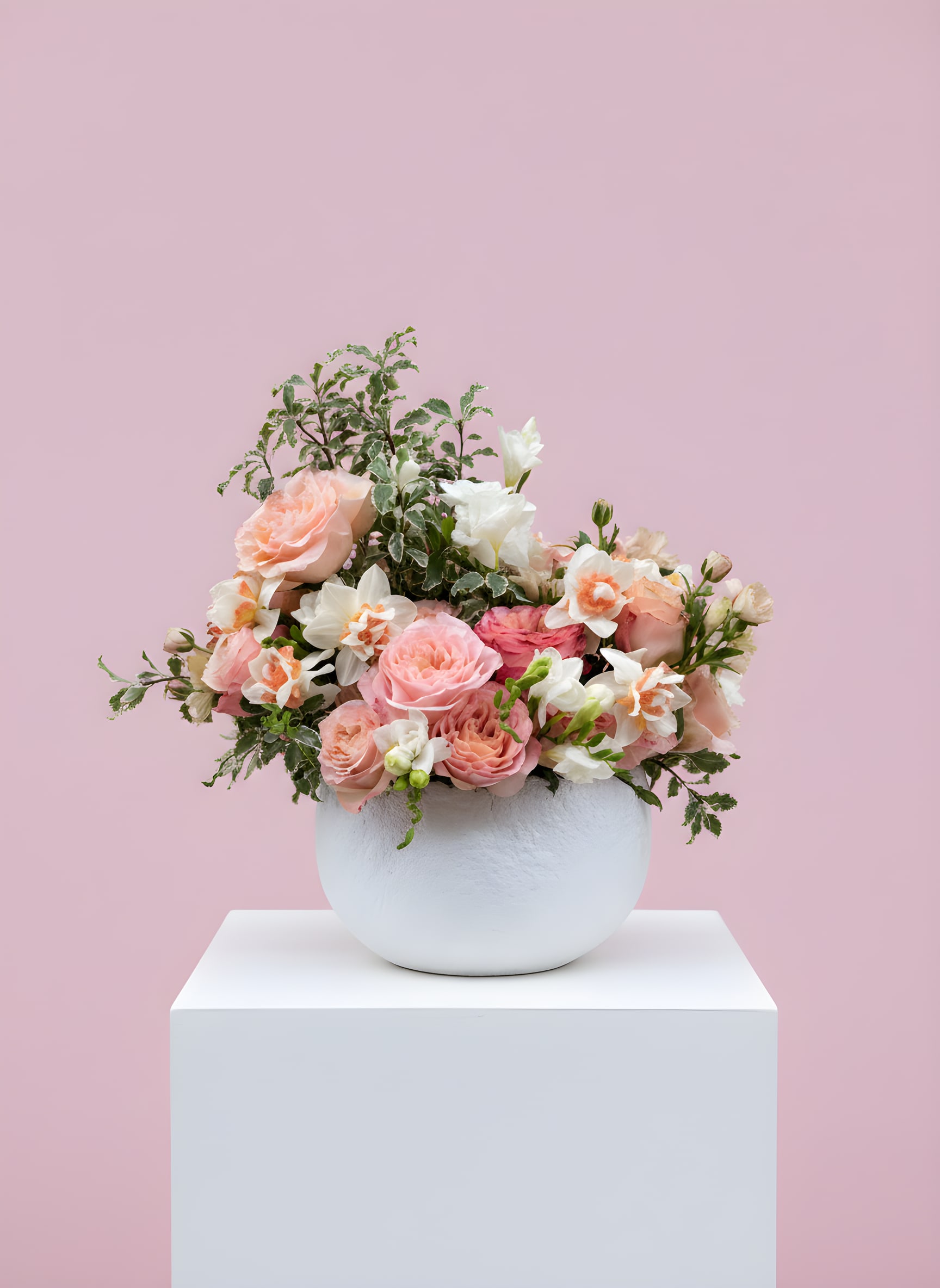 Pink Royale - Pink Royale Bold, full, and fit for a queen. A richly bloomed arrangement in the most regal shades of pink. Flower varieties and vessels may vary based on availability to ensure the highest quality.