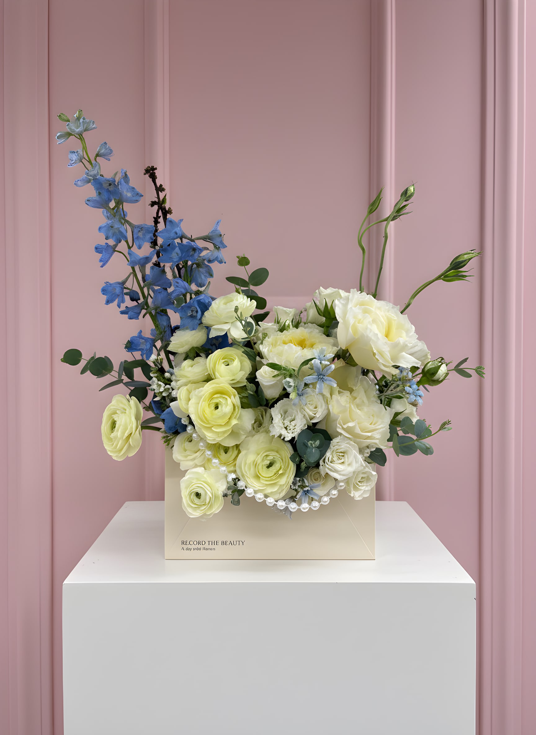White Gardenia - White Gardenia Intoxicating, elegant, and effortlessly timeless. A lush white arrangement that fills the room with both beauty and a sense of occasion. Flower varieties and vessels may vary based on availability to ensure the highest quality.