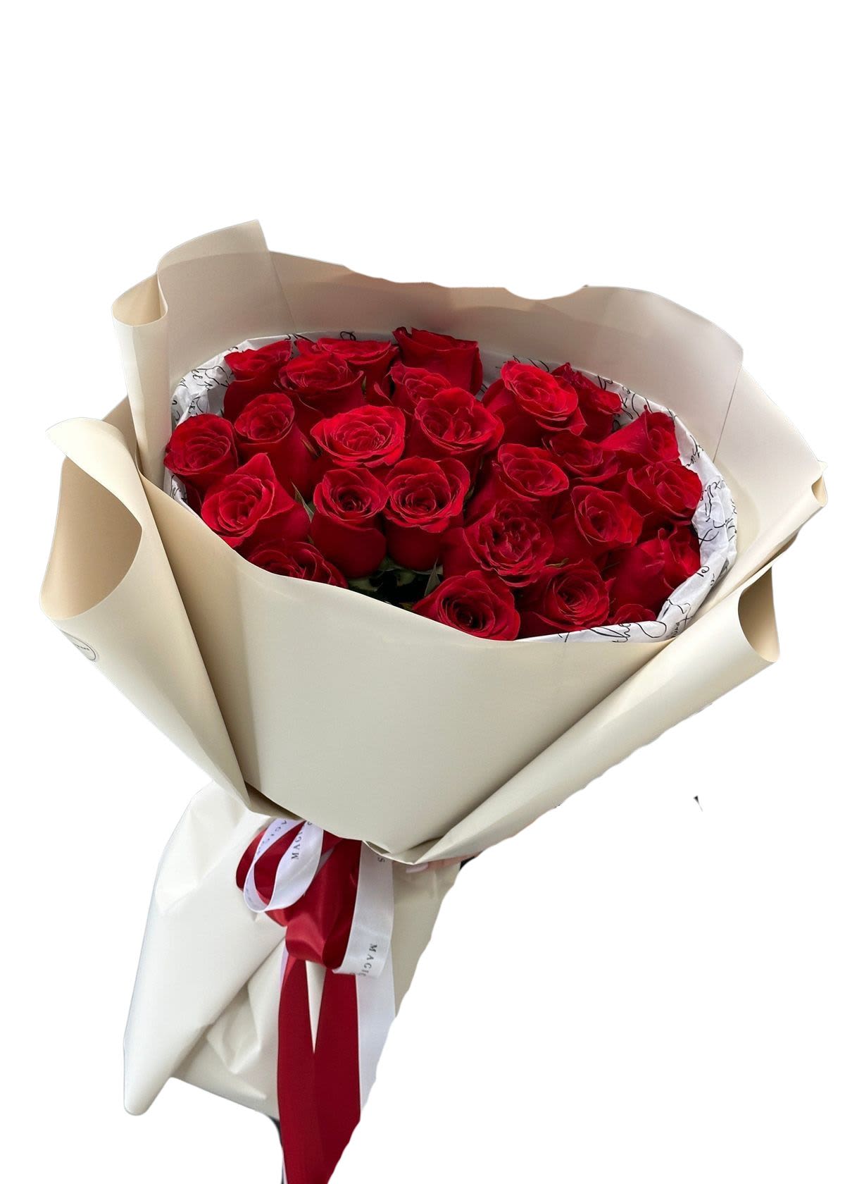 Bouquet of red roses wrapped in cream paper with a red ribbon
