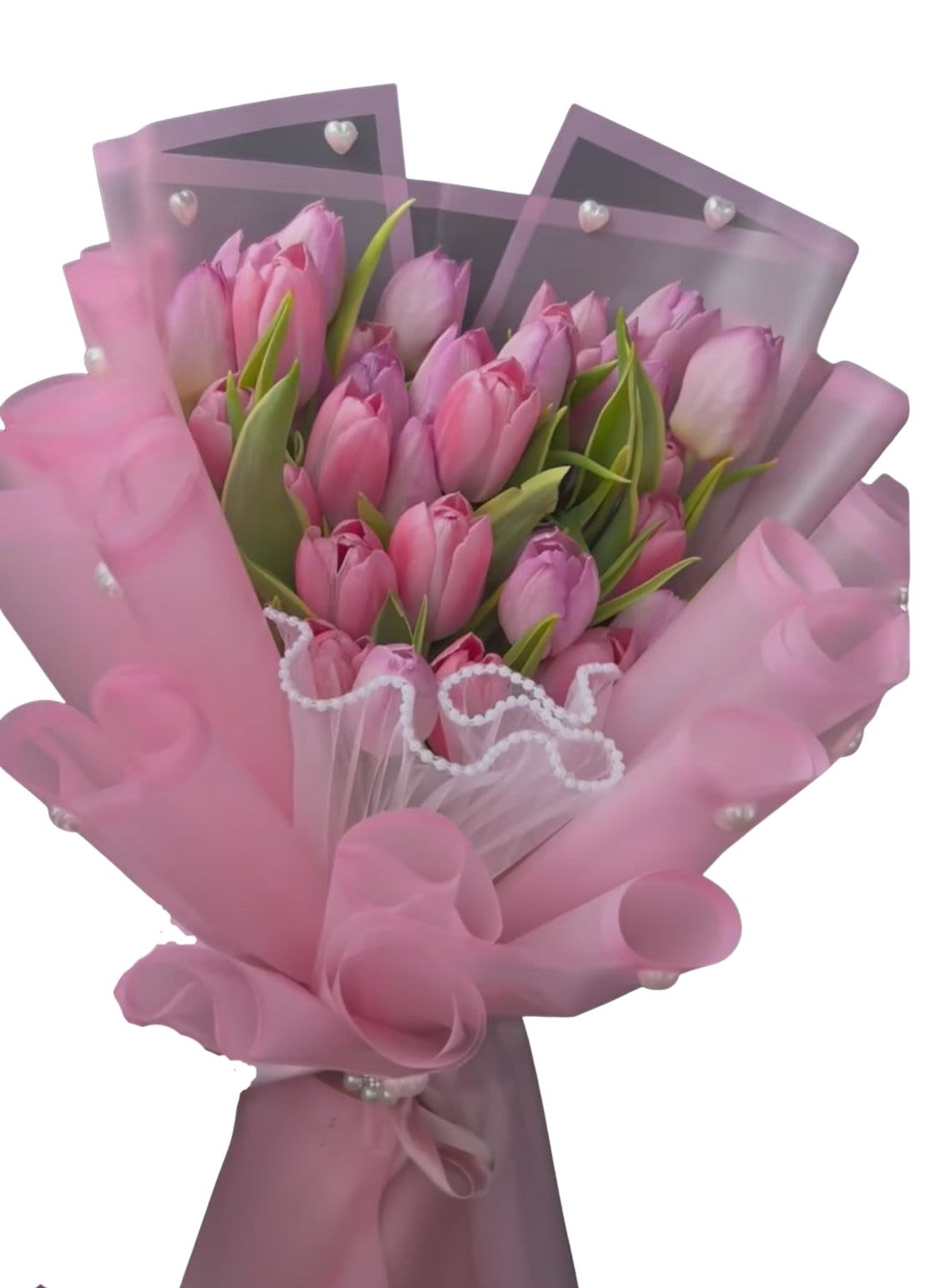 Pink tulip bouquet wrapped in translucent pink paper