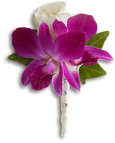 Purple and white orchid boutonniere with green leaves