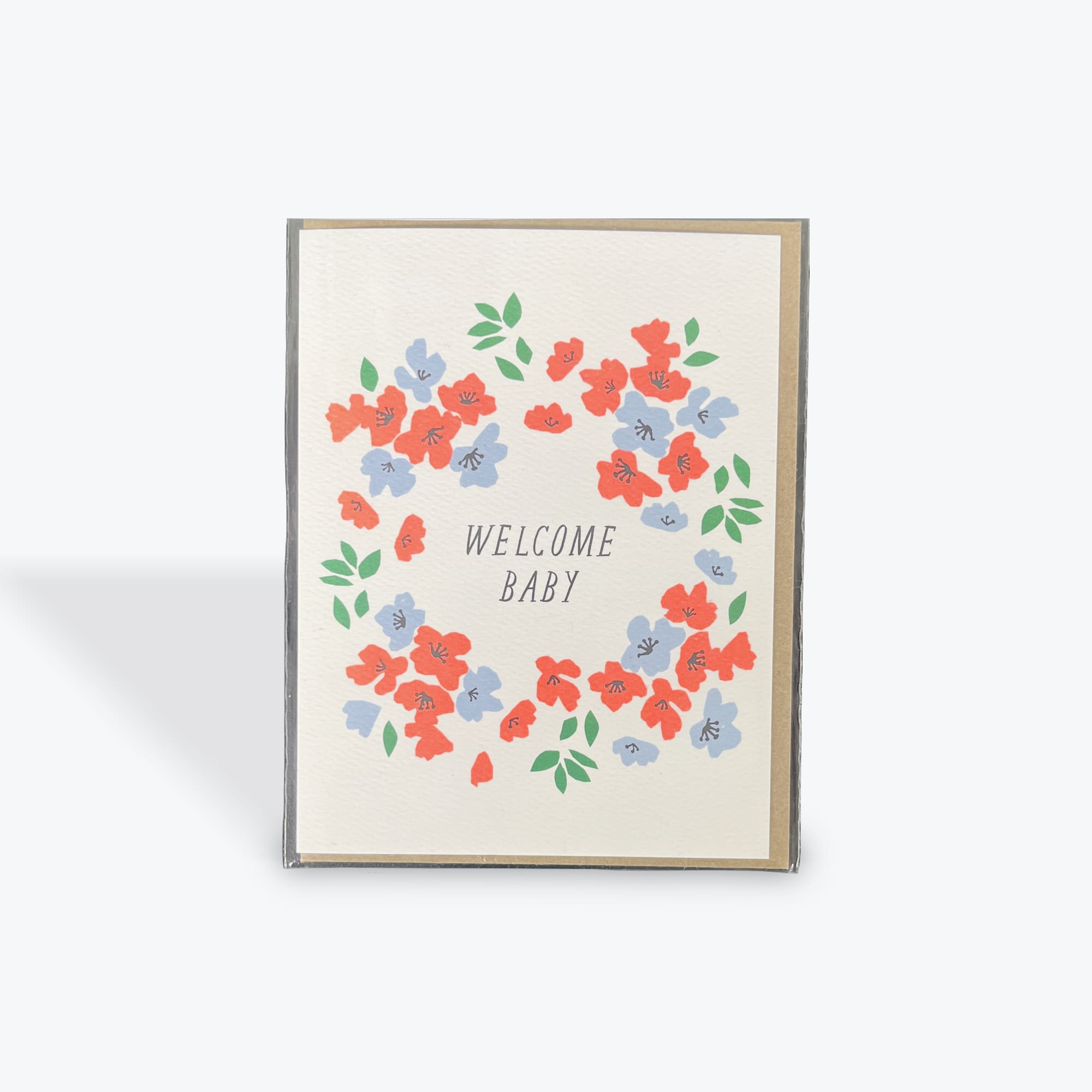 Welcome Baby card with a floral wreath in red, blue, and green