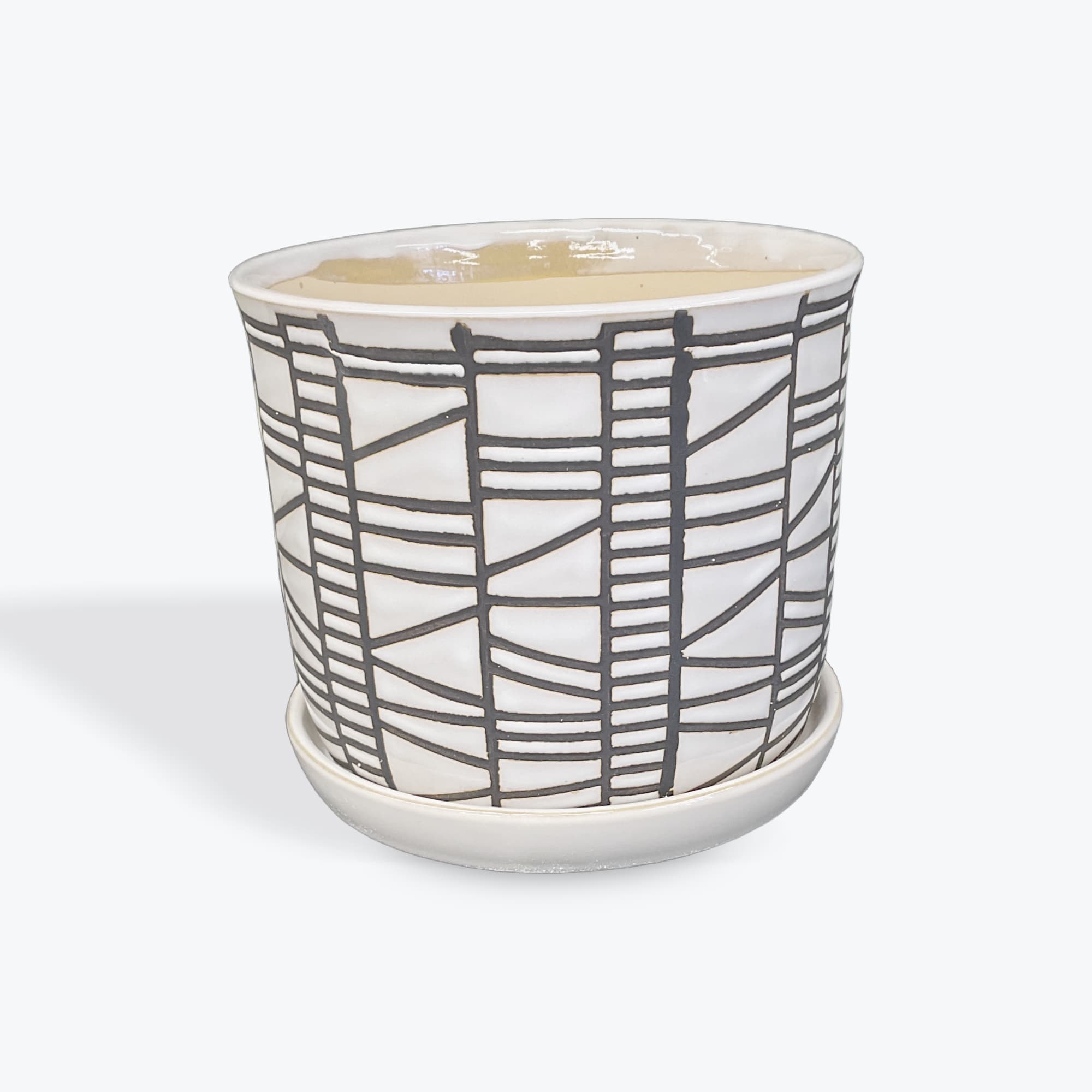 Patterned ceramic planter with matching saucer