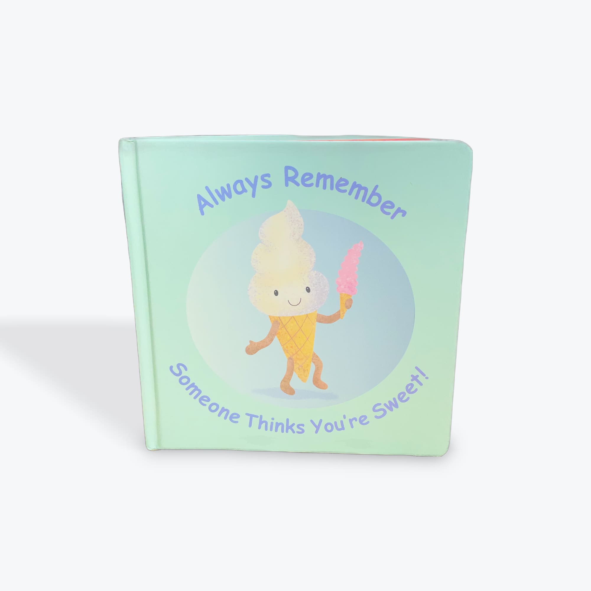 Mint-colored book with a smiling ice cream cone illustration and text