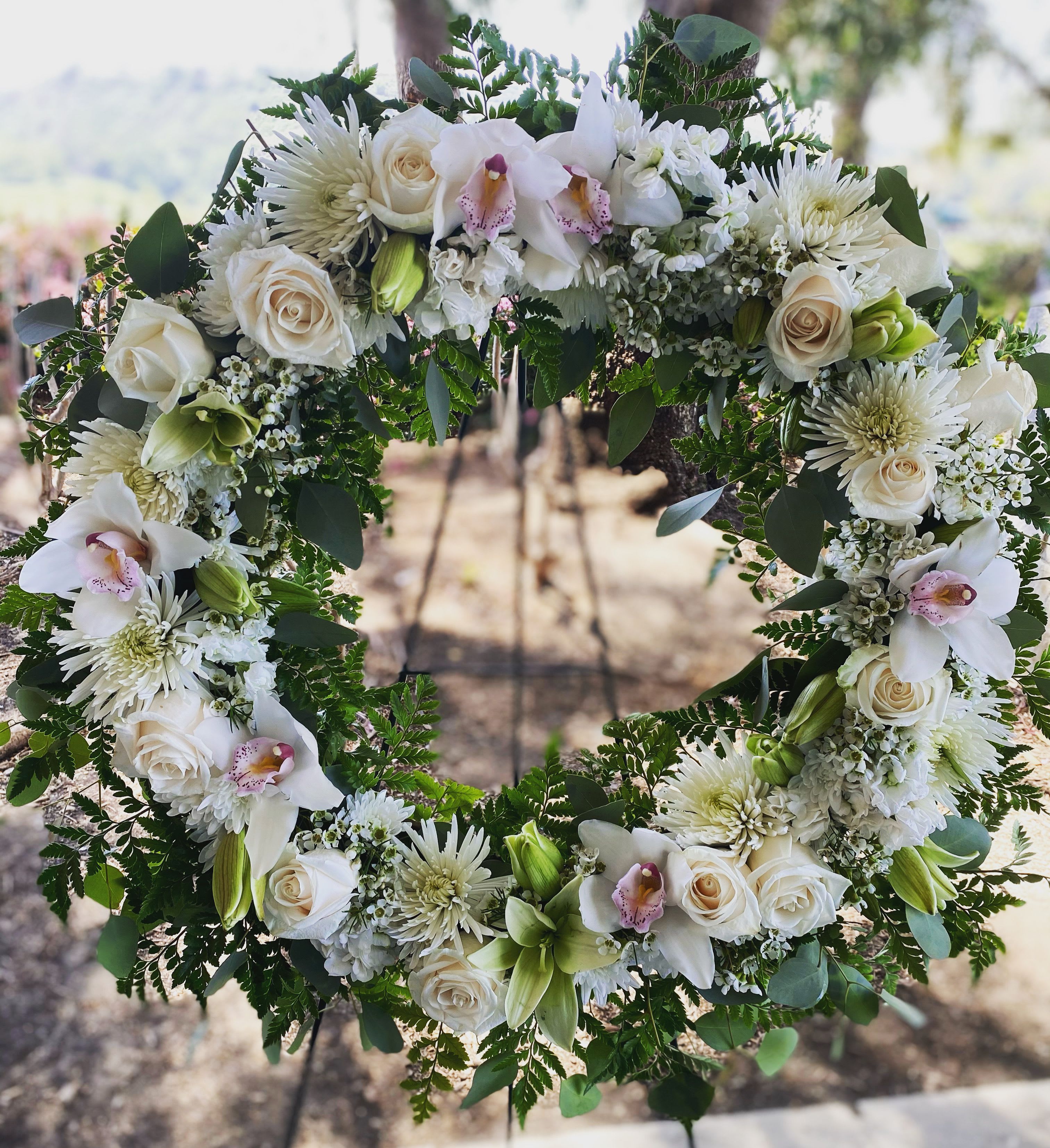 Sympathy  - Round wreath on easel 