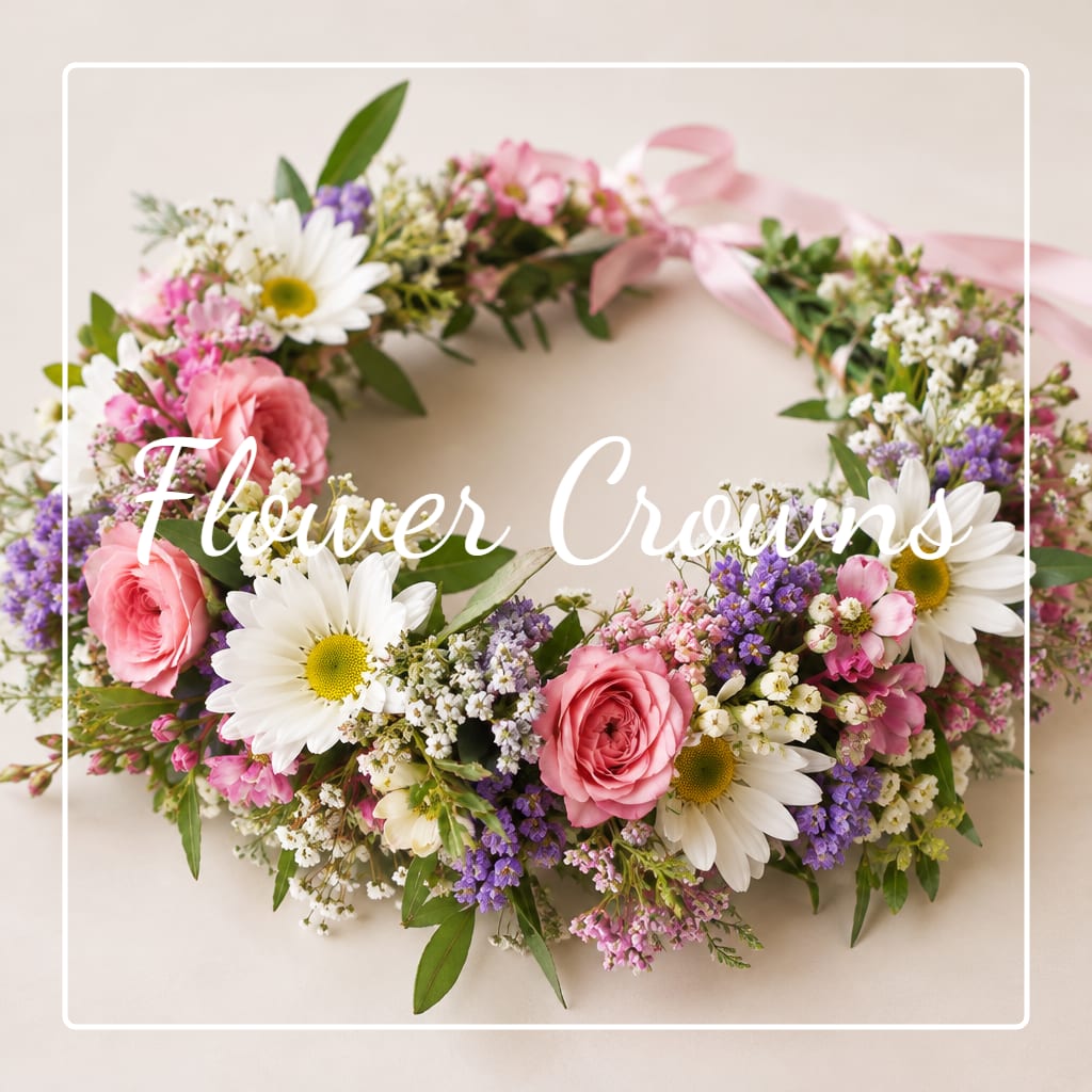 Floral crown with pink roses, white daisies, and purple filler flowers