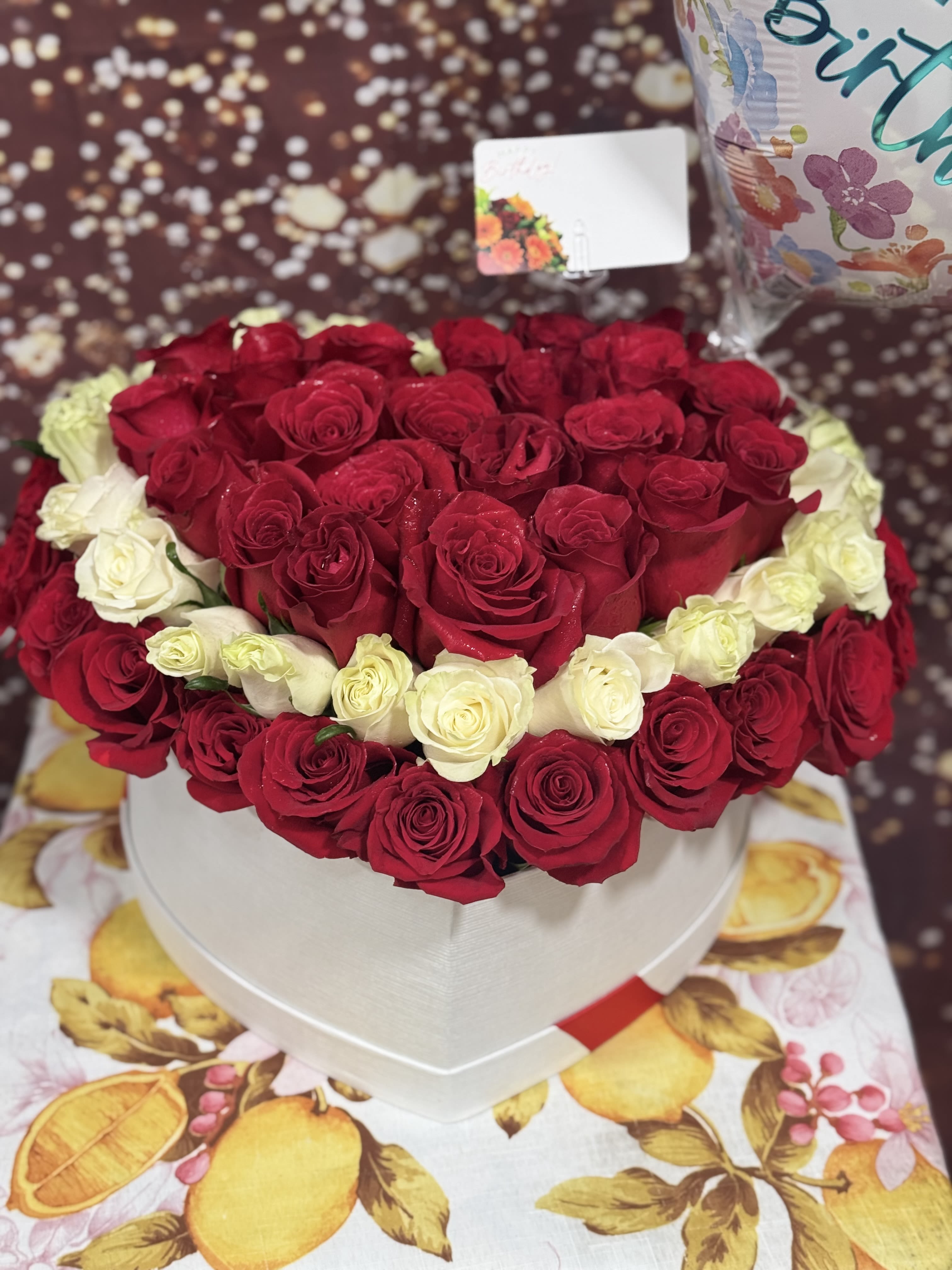 Heart  - 48 roses red and 24 roses white 