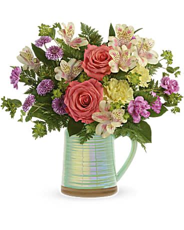 Pour On The Beauty - Additional flowers will be added to enhance the bouquet.
