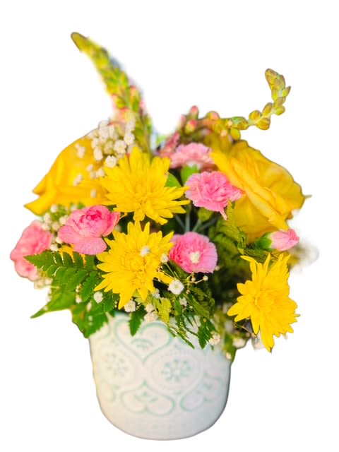 Yellow and pink bouquet in a white ceramic pot