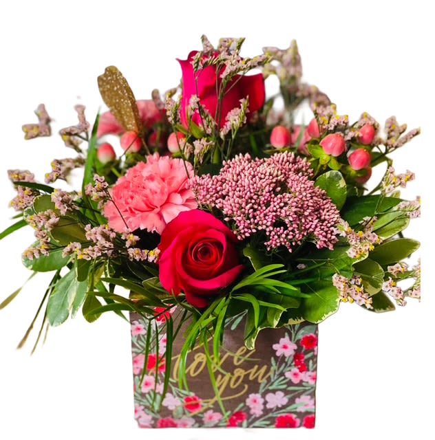 Pink and red rose bouquet in a floral gift box