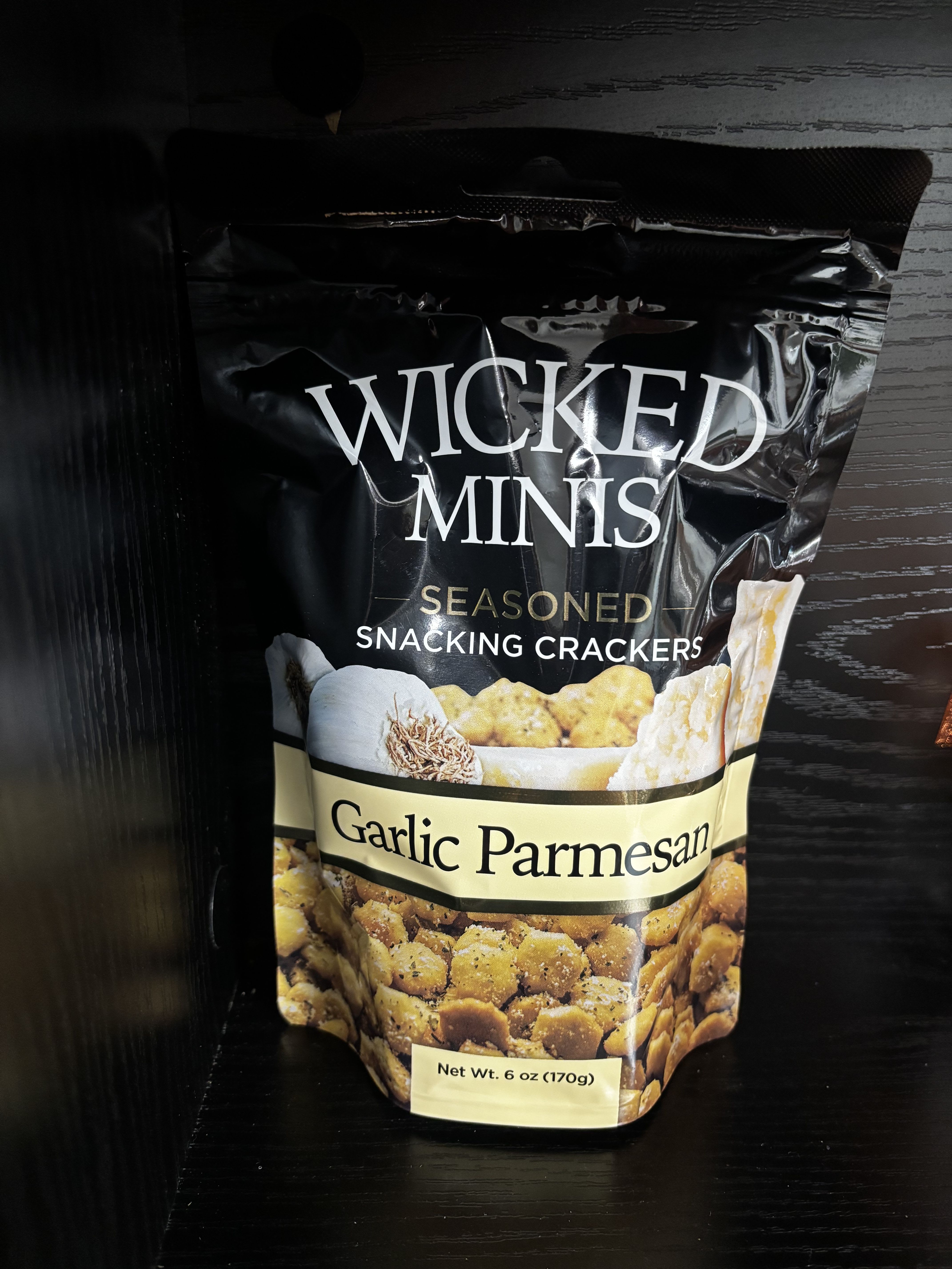 Bag of Wicked Minis garlic parmesan seasoned crackers