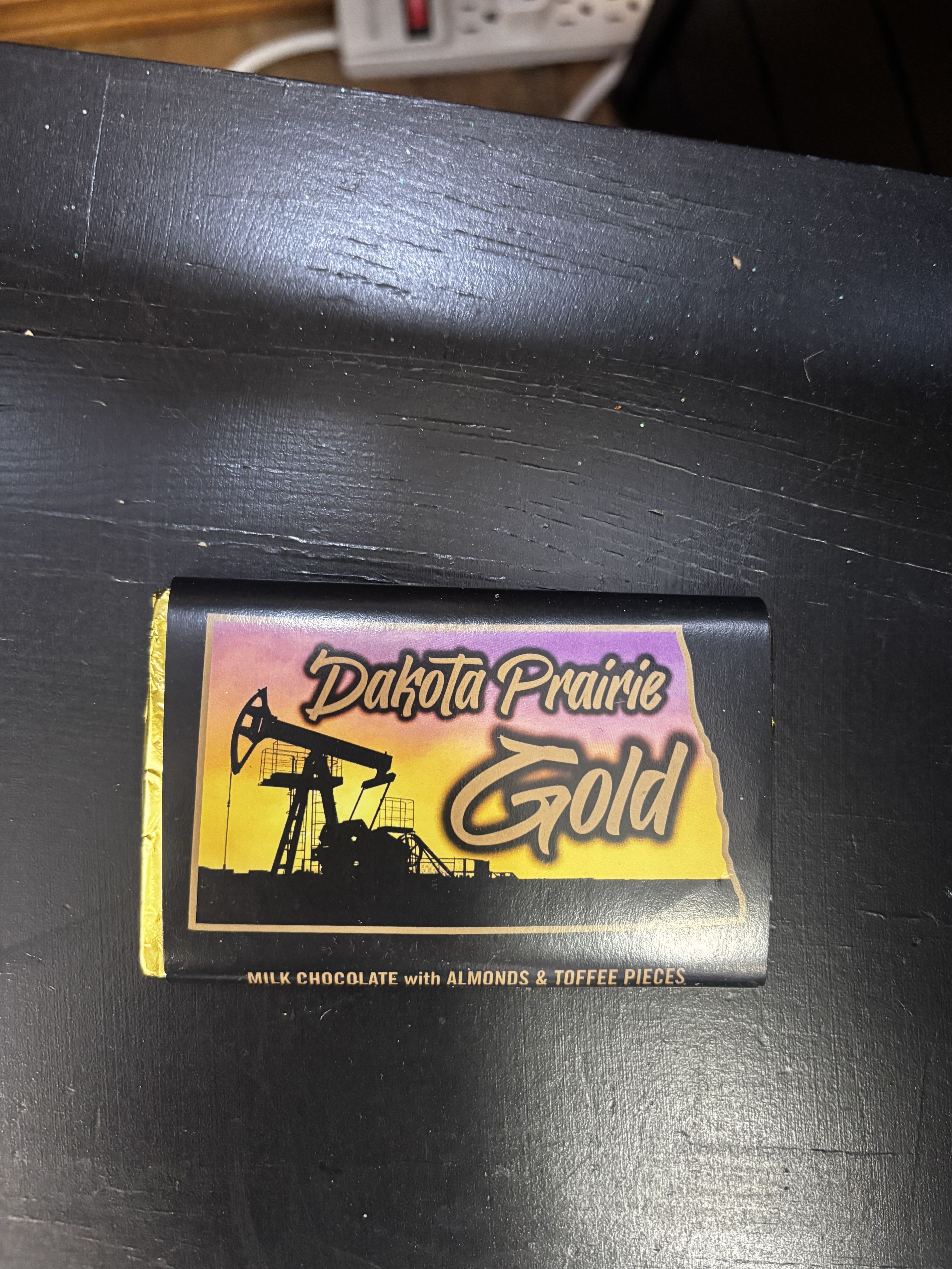Chocolate bar wrapper labeled Dakota Prairie Gold
