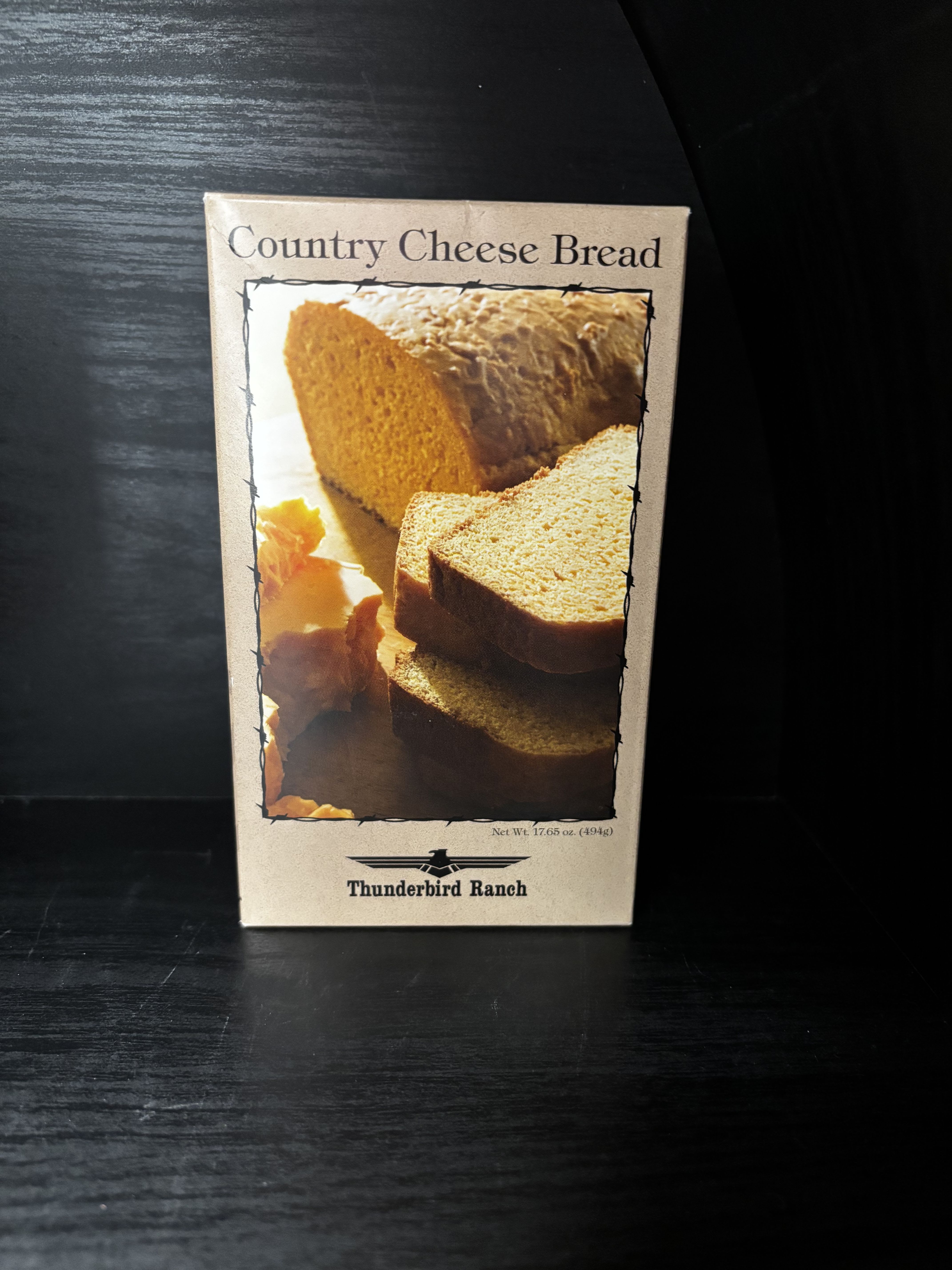 Box of Country Cheese Bread mix on a dark surface