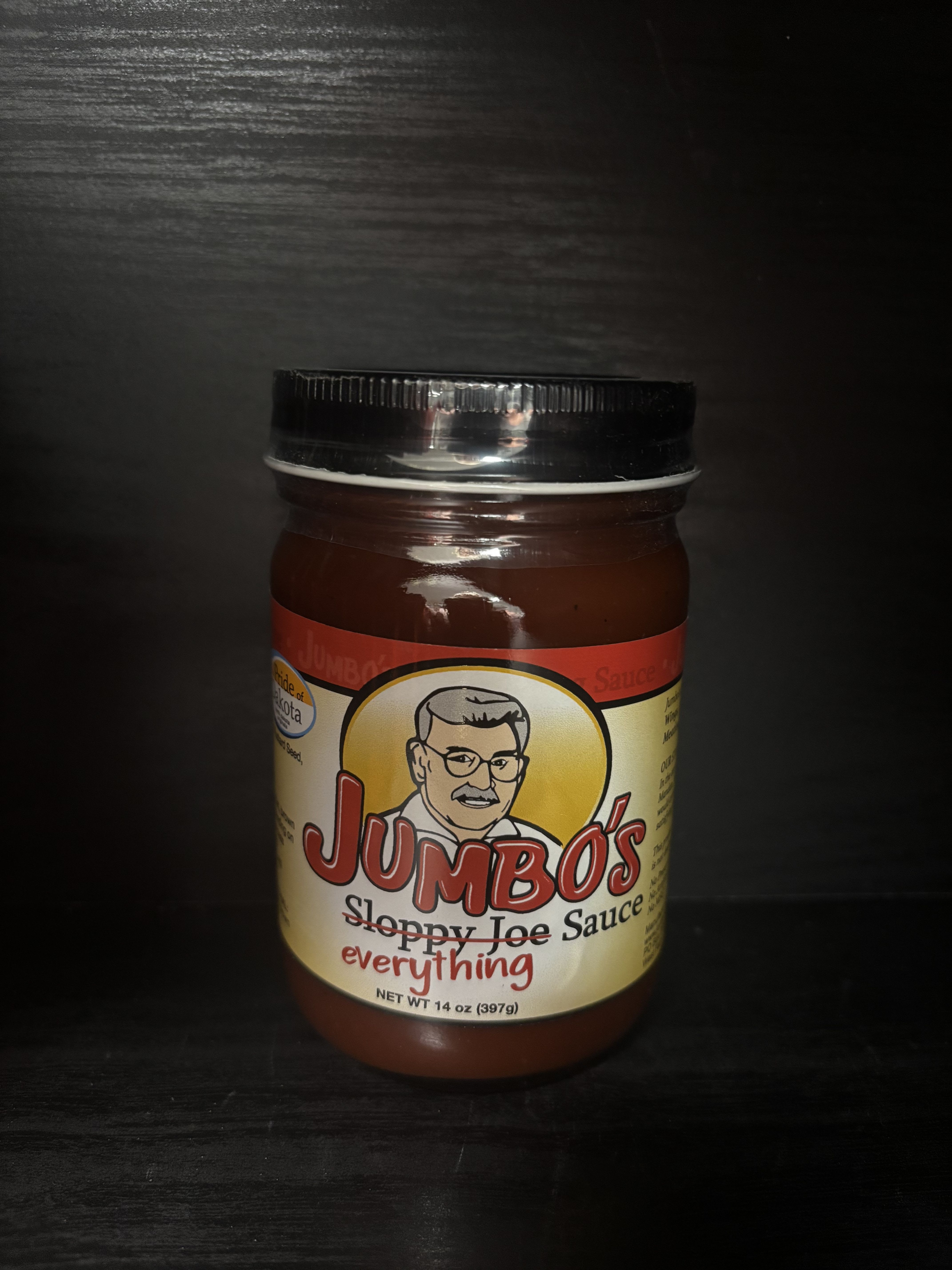 Jar of JUMBO's Sloppy Joe sauce with a black lid