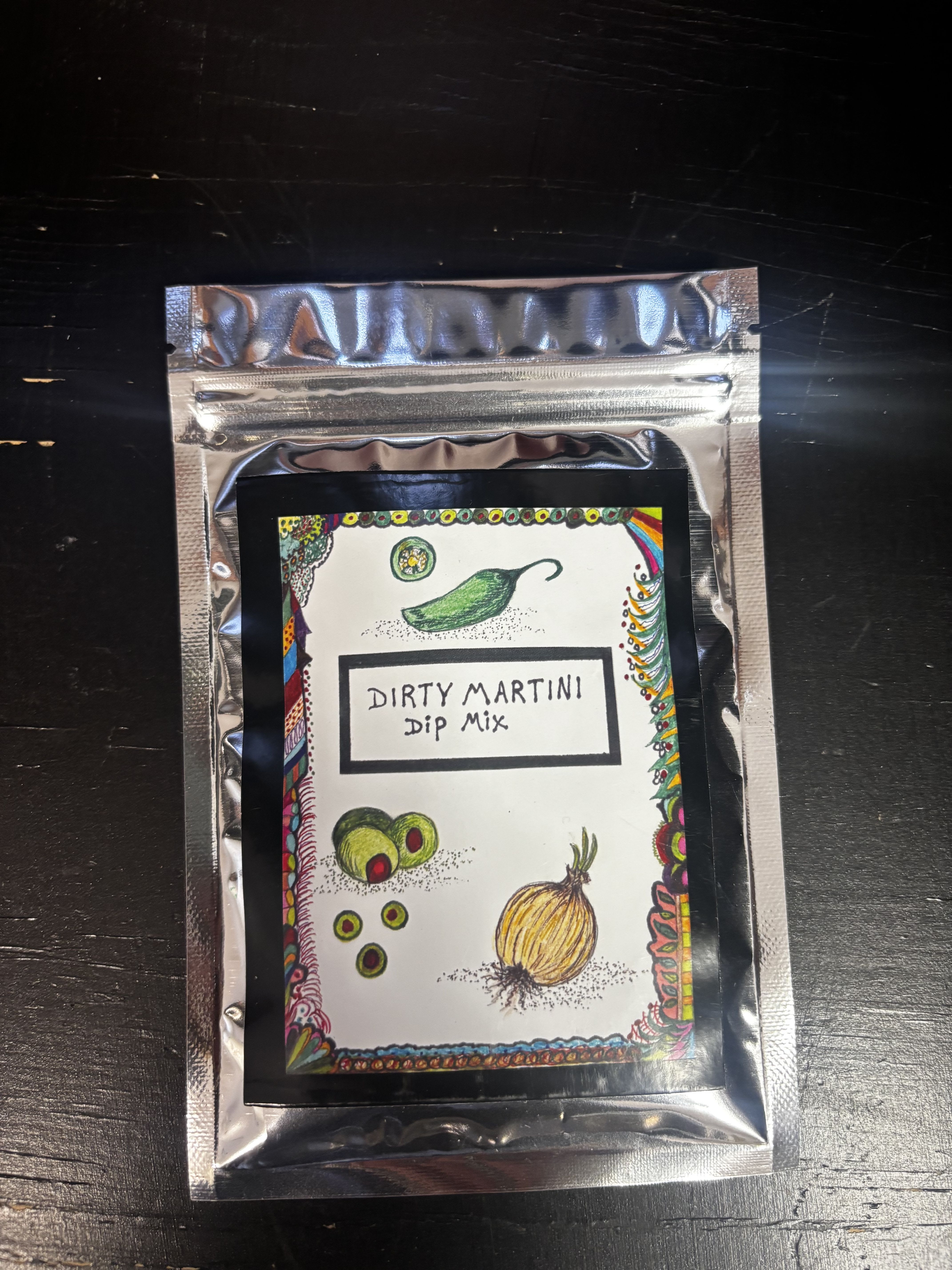 Silver packet labeled Dirty Martini Dip Mix