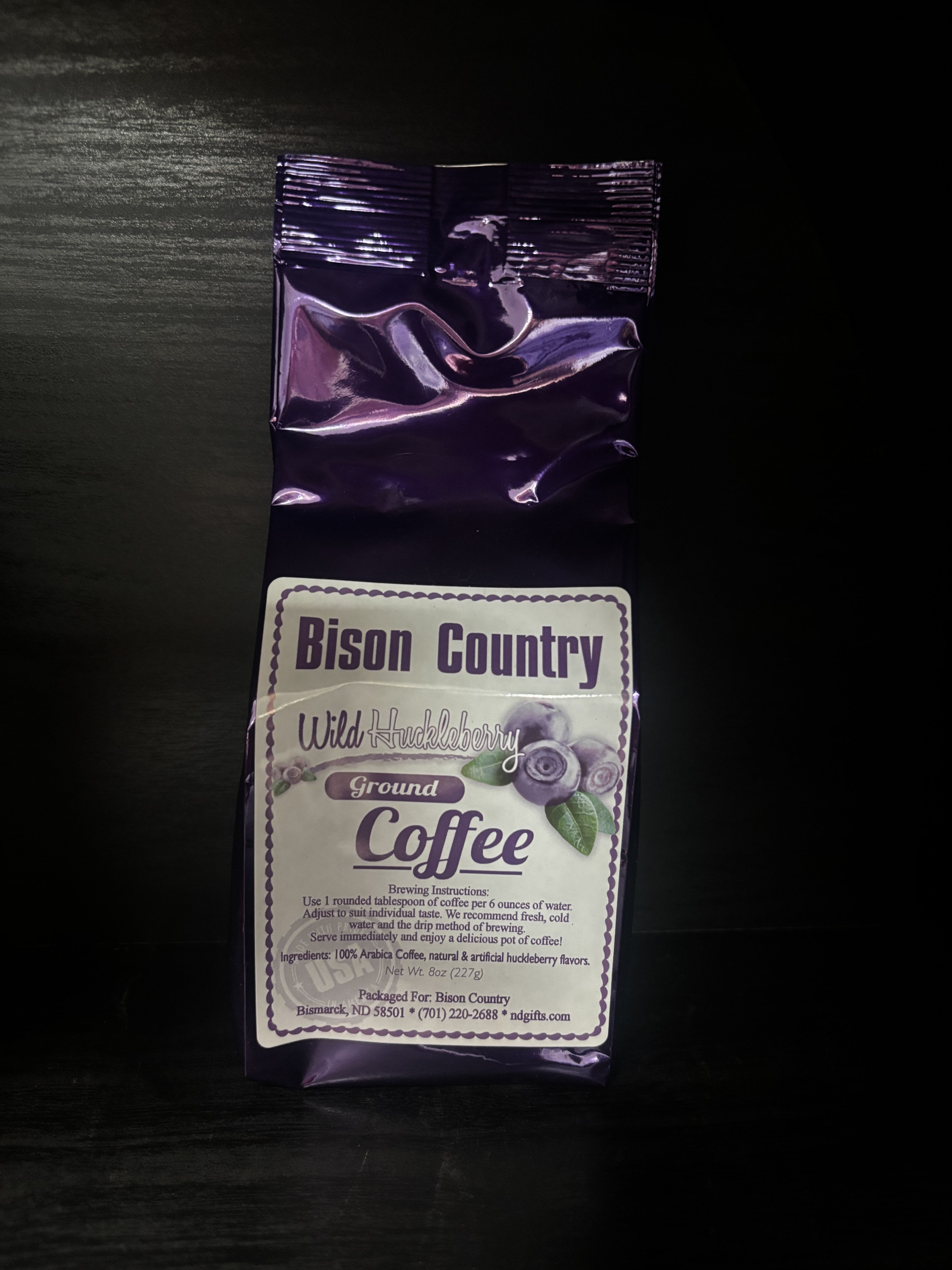 Purple bag of wild huckleberry ground coffee