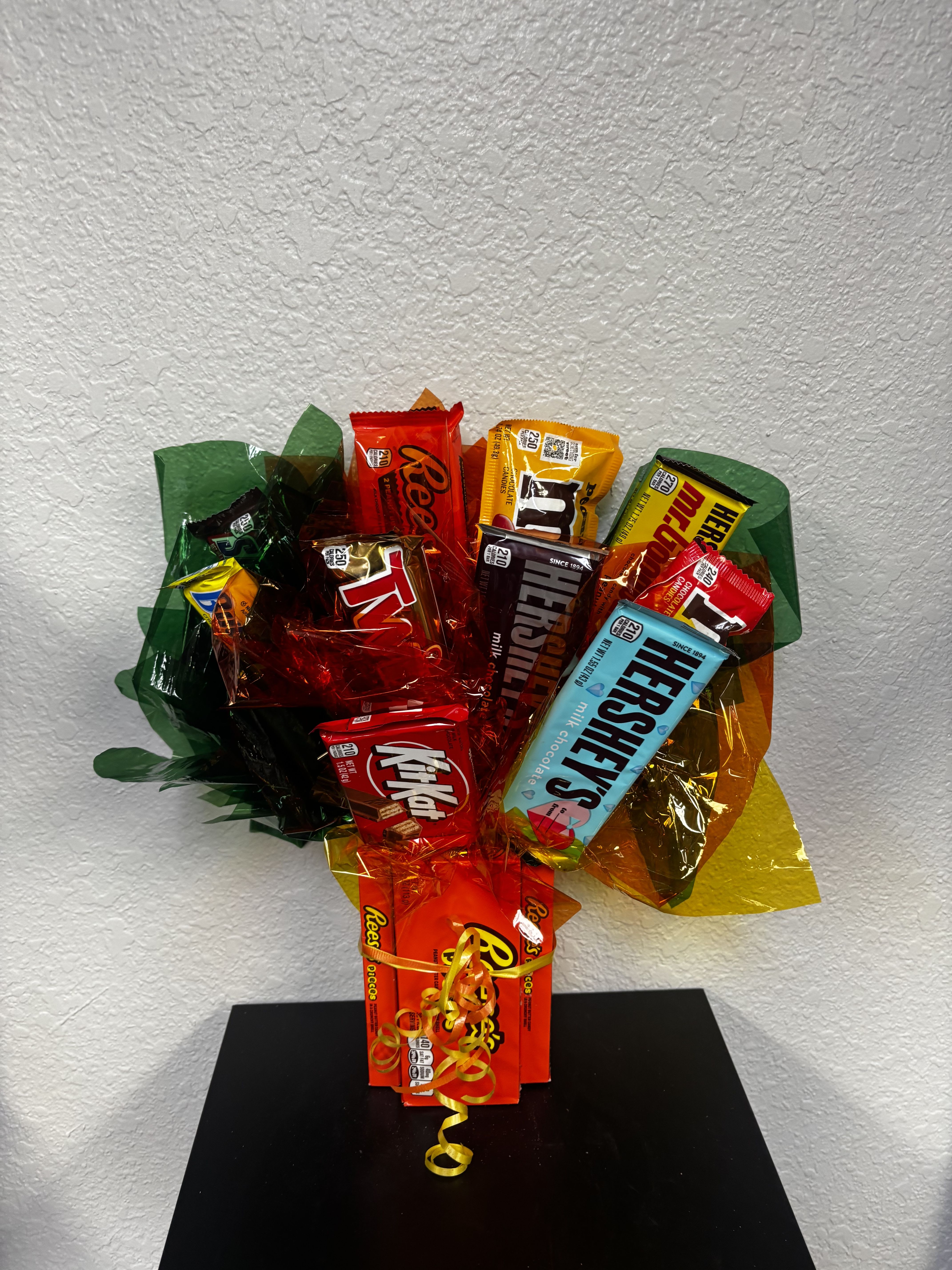 Bouquet of assorted candy bars wrapped in colorful cellophane